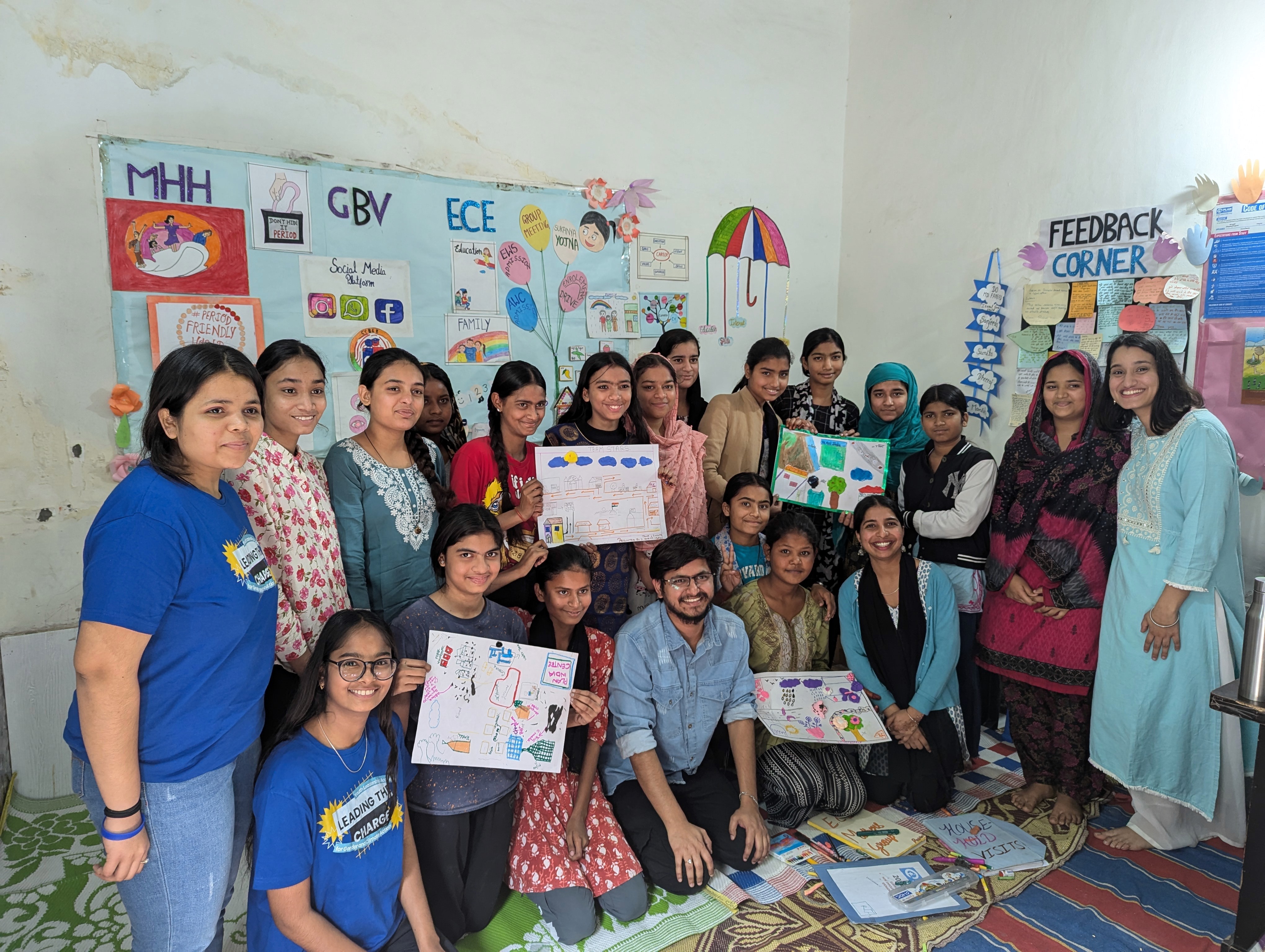 A group photo of Rohit Sharma, Ishita Dutta with participants at a Girls' Climate Parliament workshop