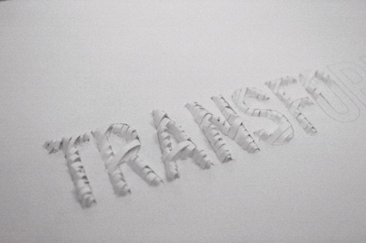 typography project made with thin pieces of paper cuts as the contour of the letters