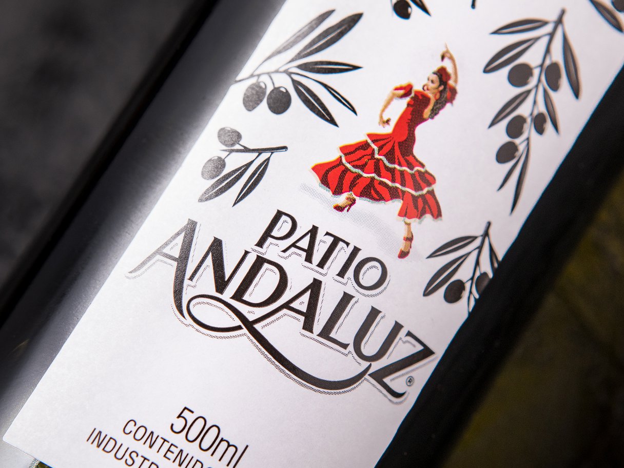 Rooftops of a coastal town with the sea in background