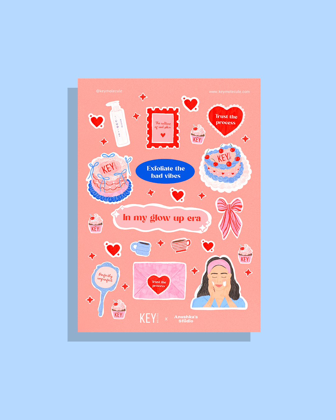 A close-up of a hand wearing multiple decorative rings against a blue background.