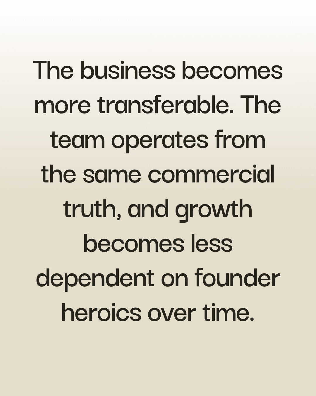 A model wearing a light blue robe over a white shirt stands confidently on the runway, set against a backdrop featuring a large, colorful portrait.