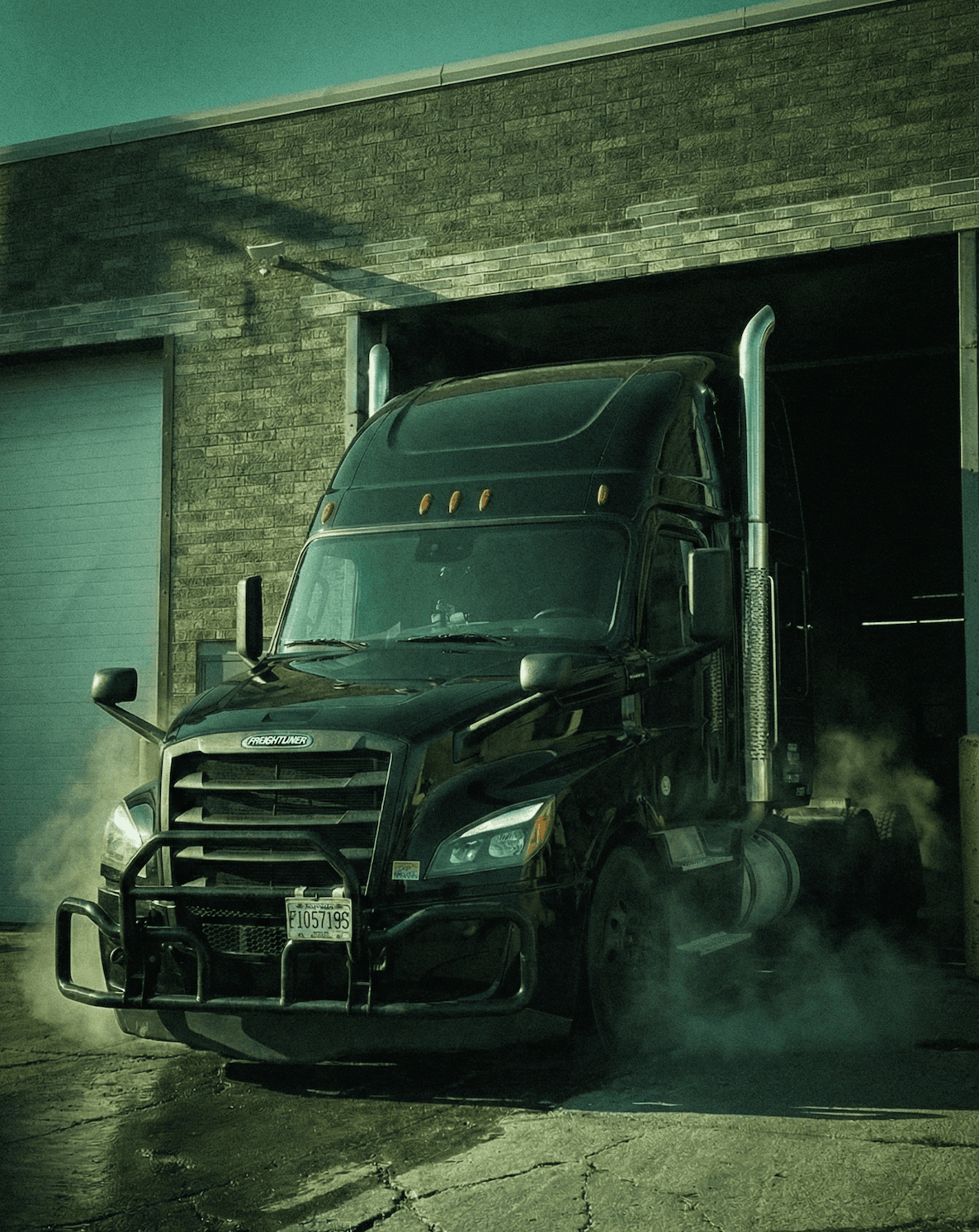 Mechanic working on motobike