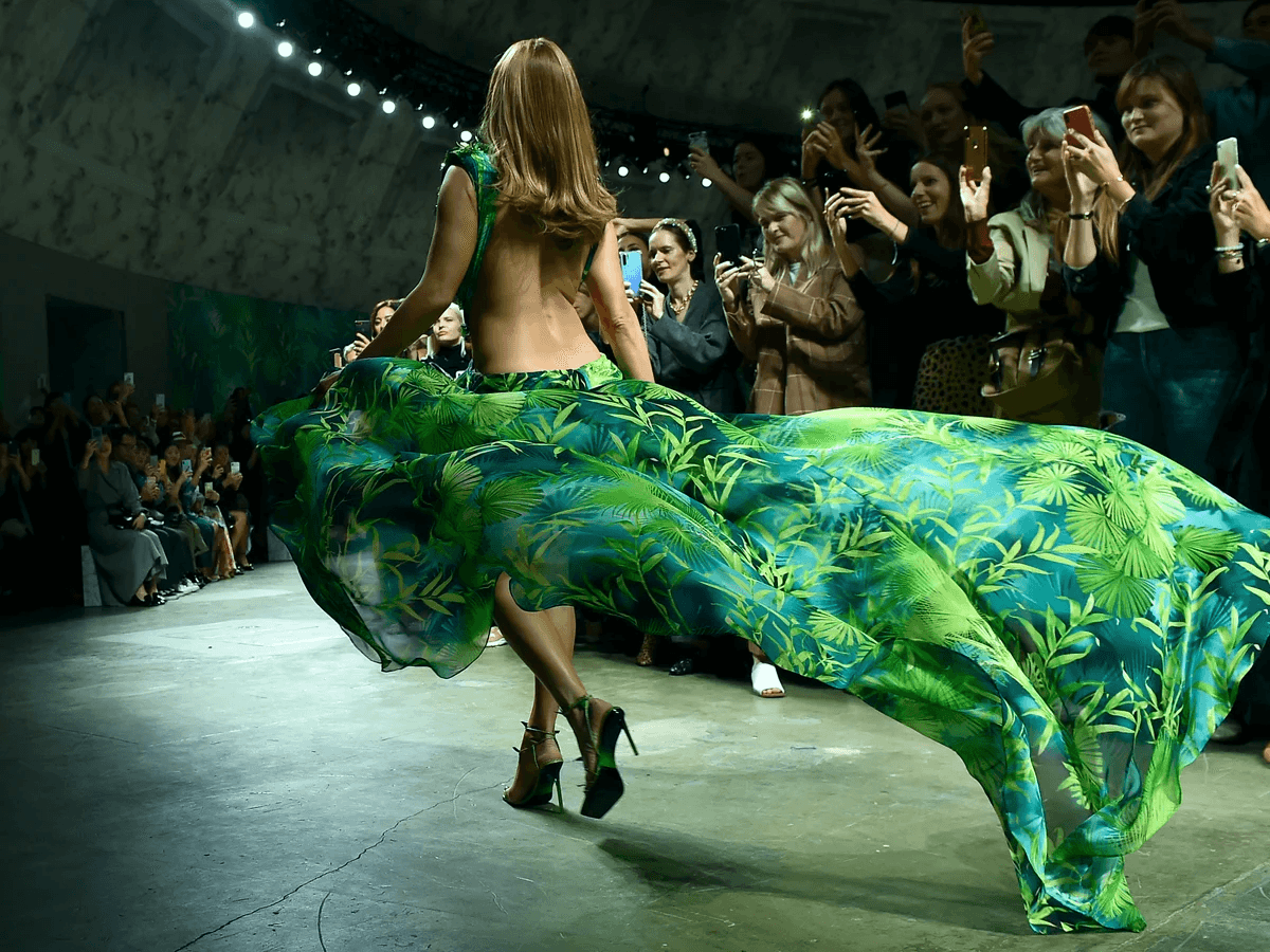 Audience attending a luxury fashion show during a live runway presentation