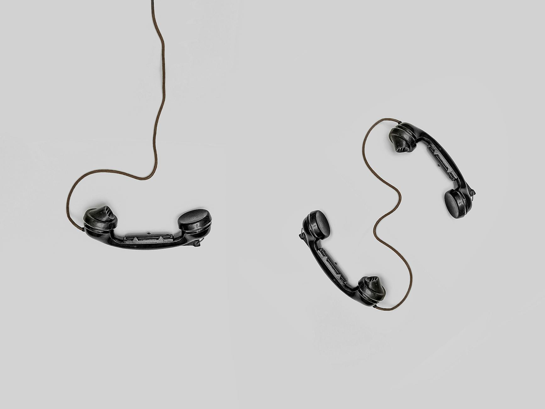 Multiple phones are on a gray ground