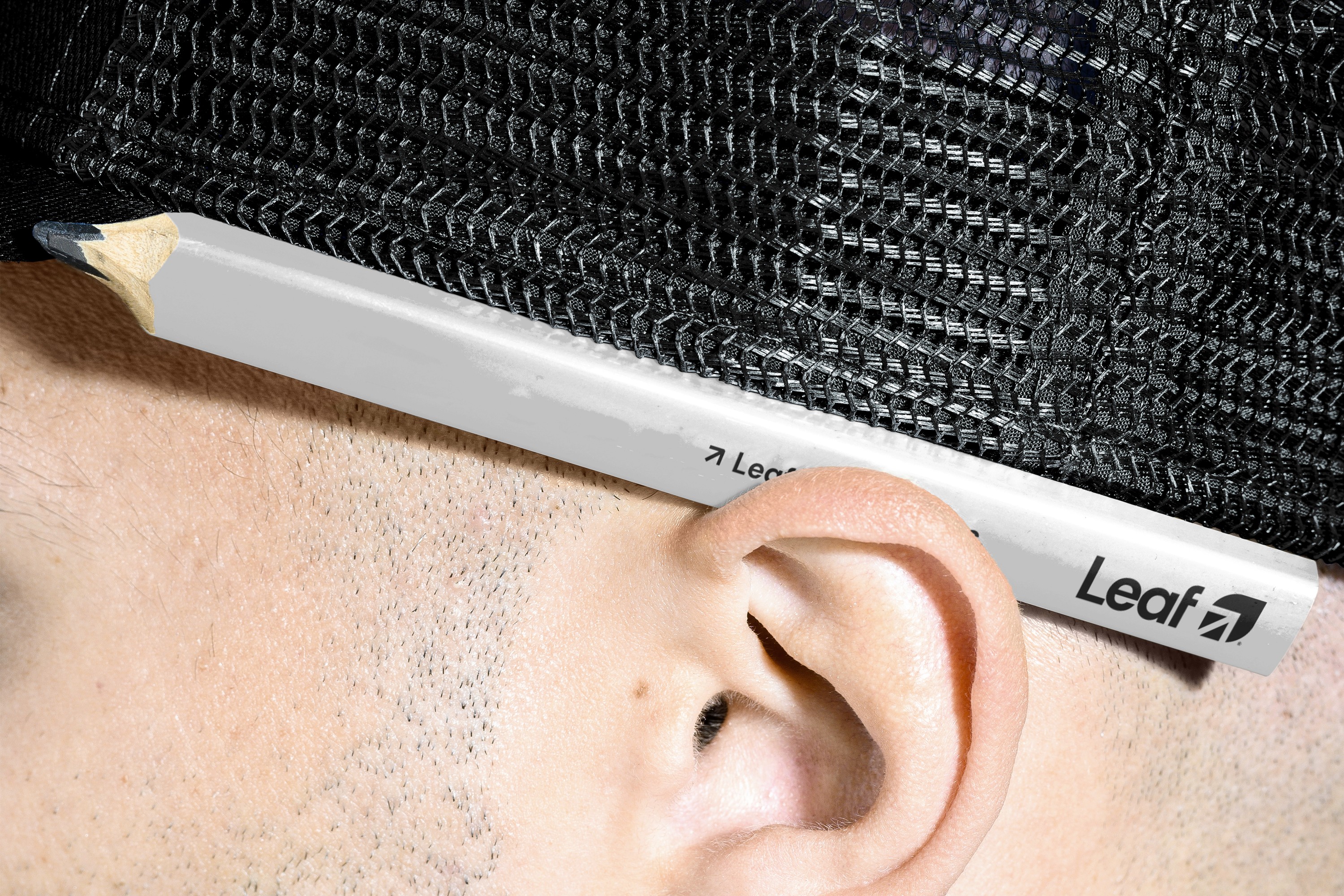 Streetside billboard with flyposters of the Batch.Works brand and illustrations