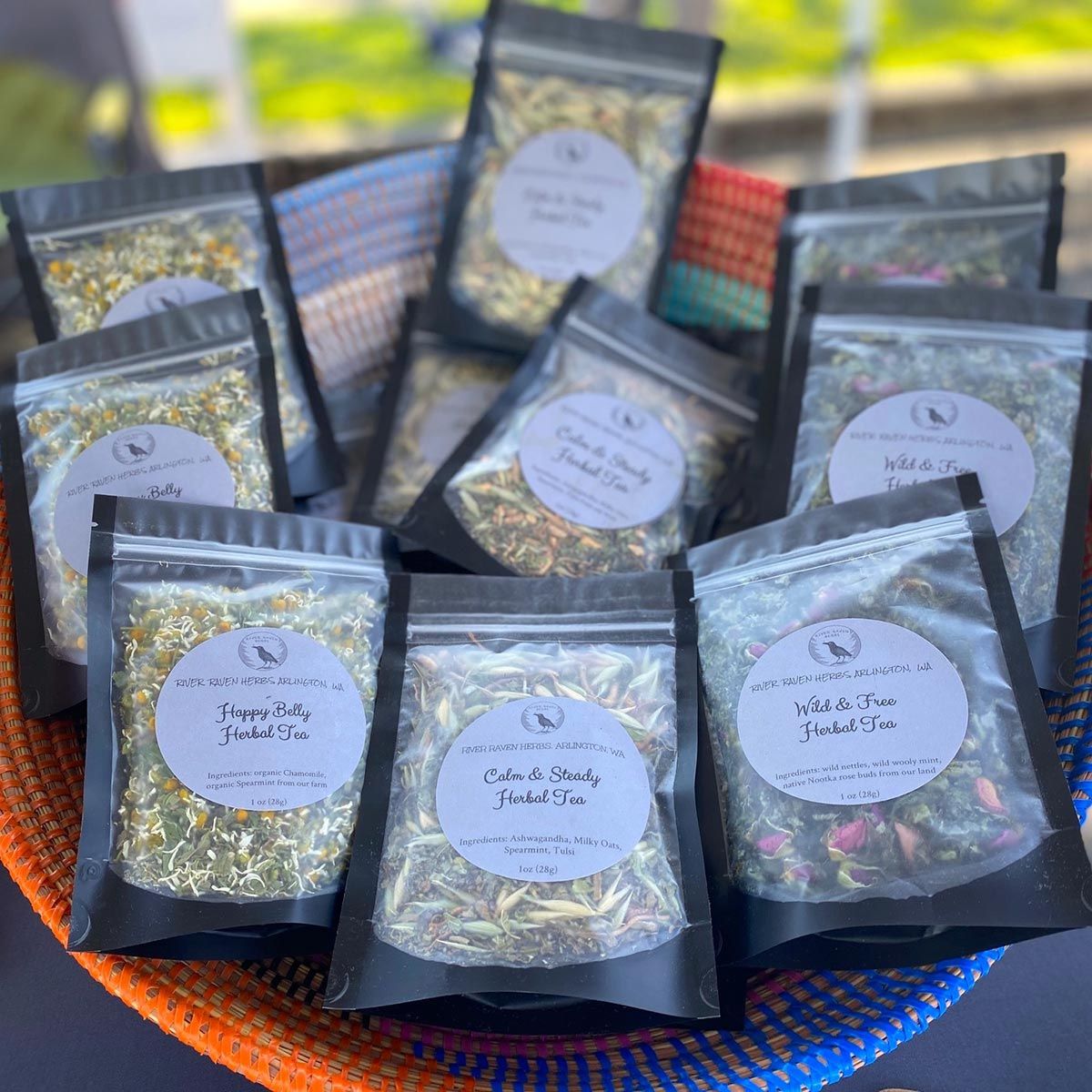 Packaged herbal products displayed together from River Raven Herbs.