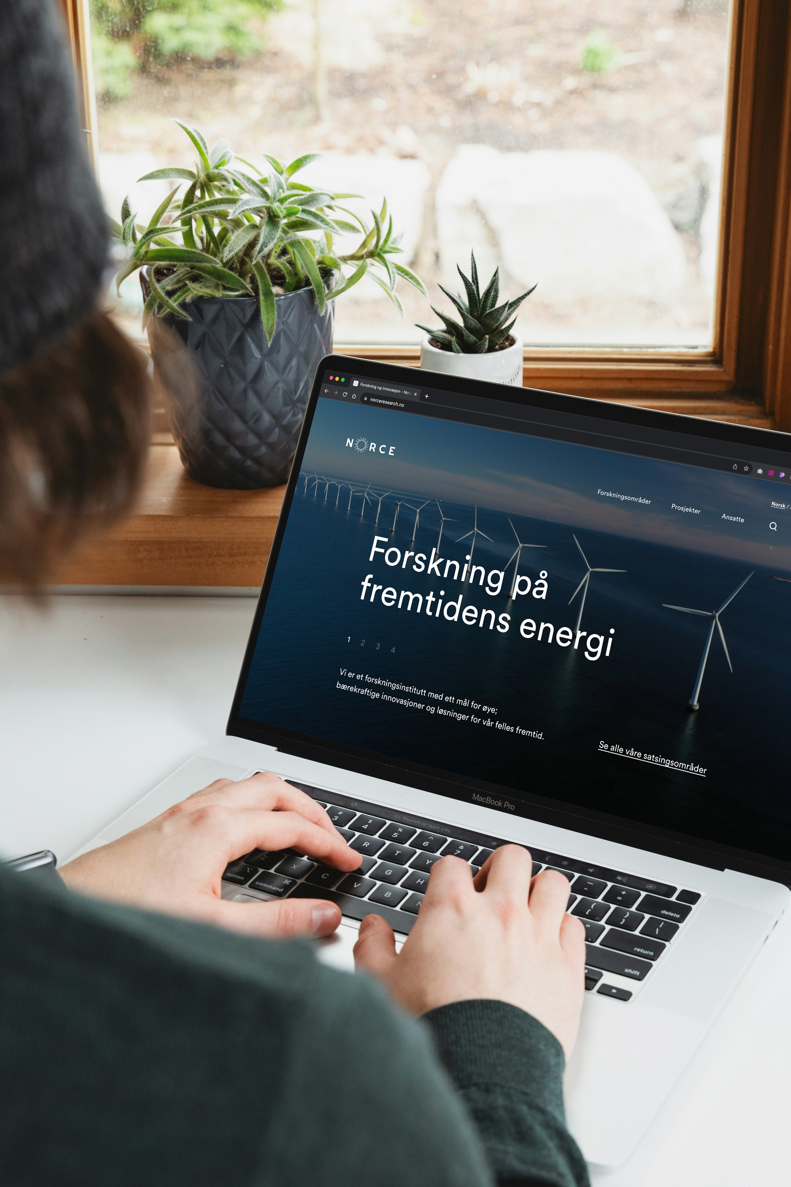 A mockup for a Macbook placed on a table