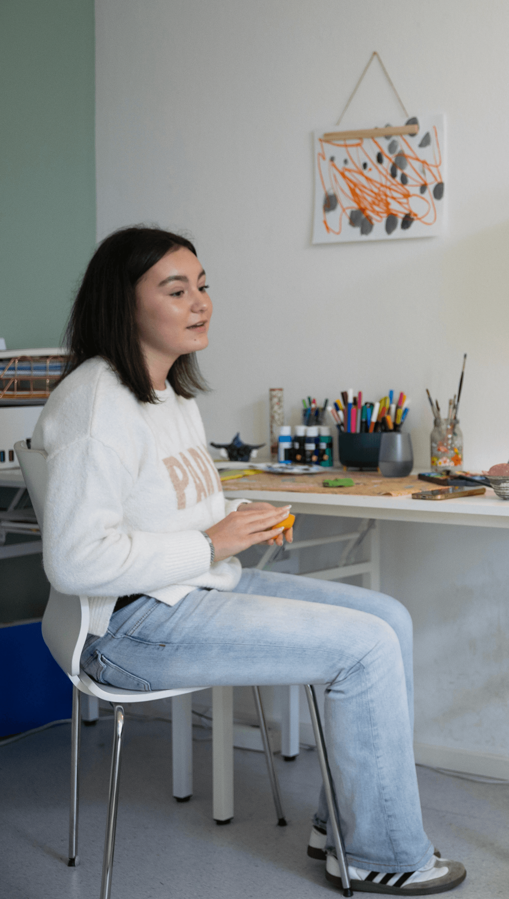 Teenager with clay