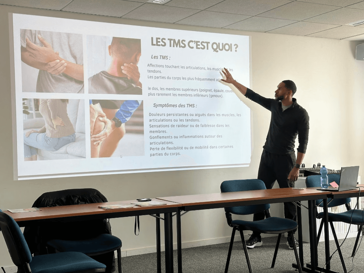Conférence de sensibilisation aux TMS animée par un coach Sedencia en entreprise