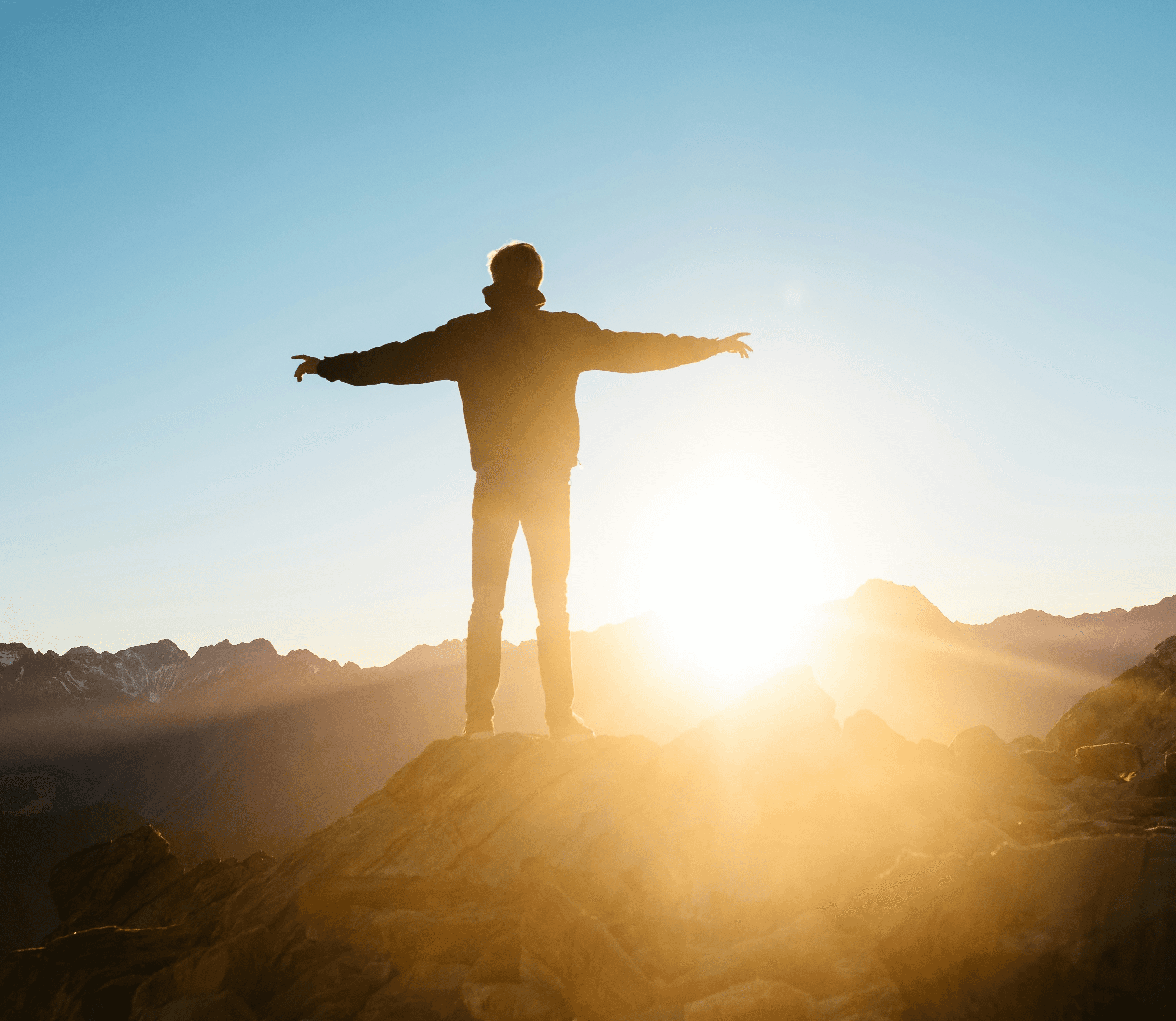 person standing on hill