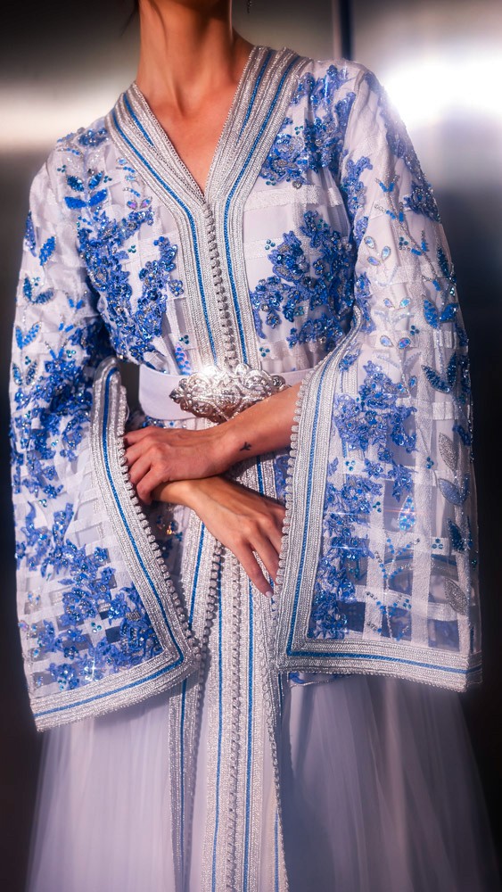 Light blue Moroccan bridal caftan with intricate hand embroidery, luxury handcrafted piece for weddings in Bahrain