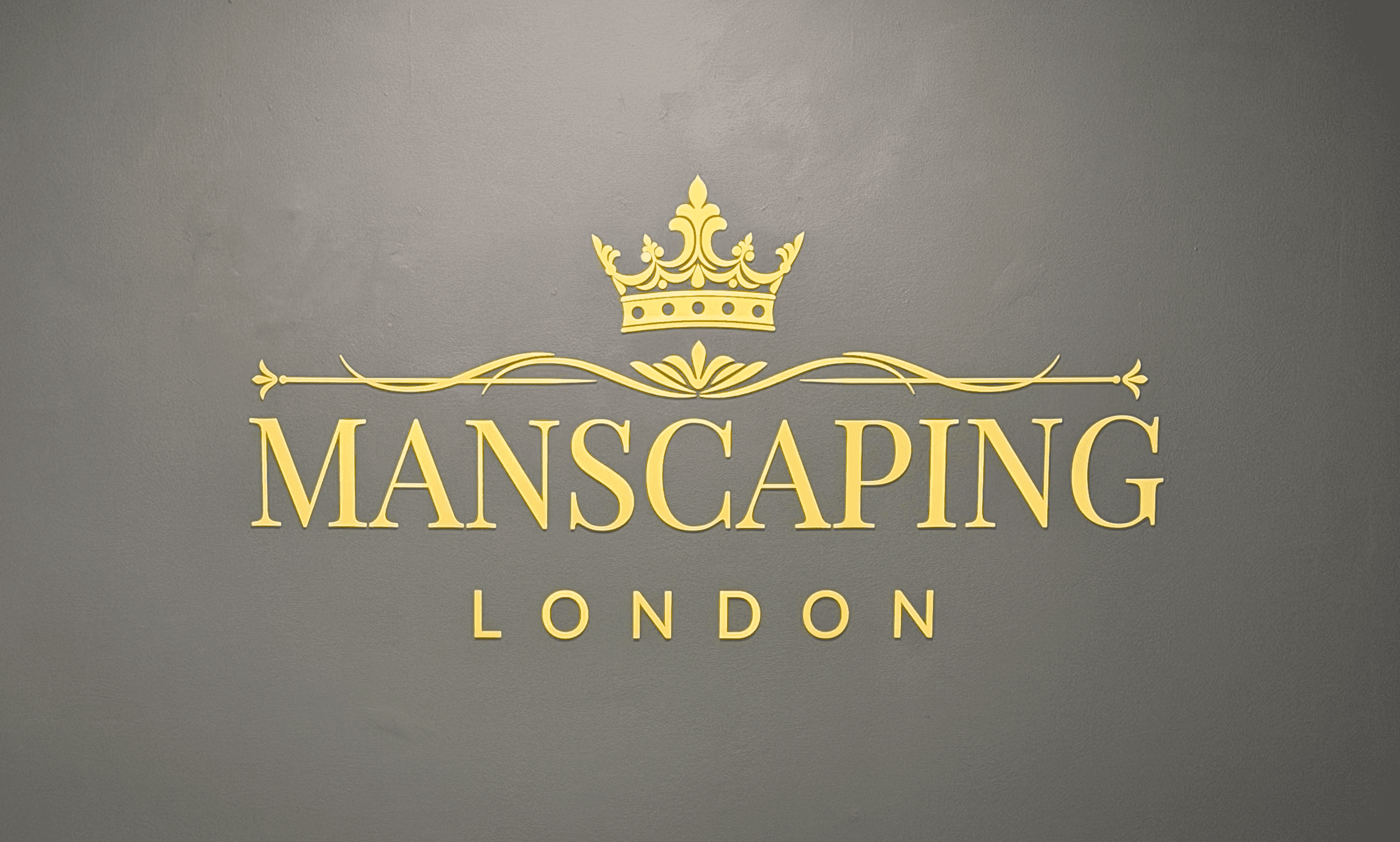 Picture of manscaping treatments table, showcasing the golden logo on the wall