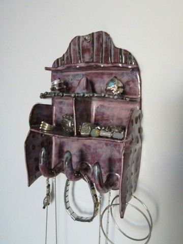 Purple glazed ceramic wall-mounted jewelry holder with hooks and shelves