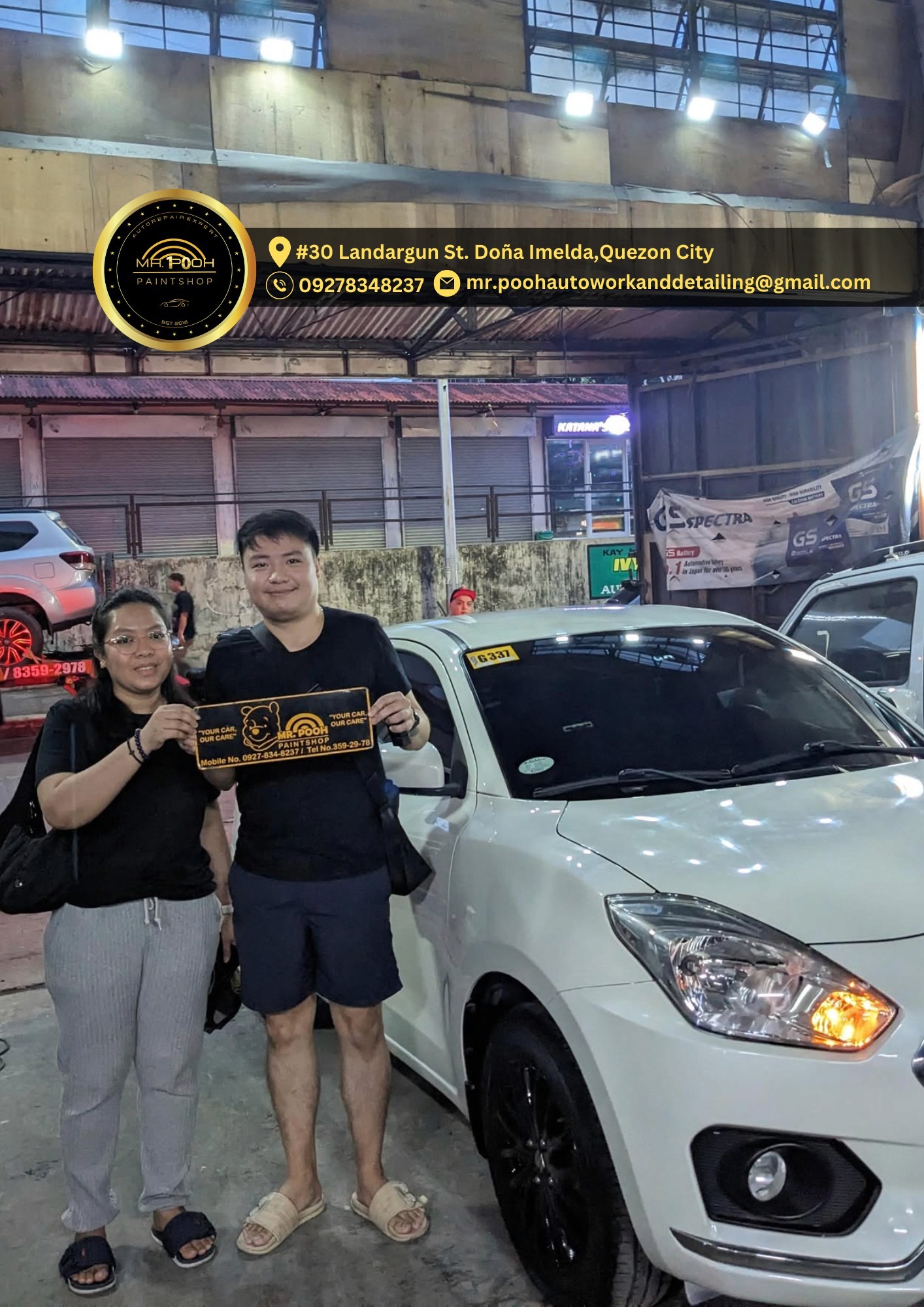 A bottle of daisy perfume with floral accents.