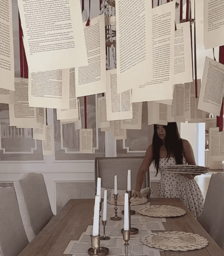 A man playing a drum in front of a group of people