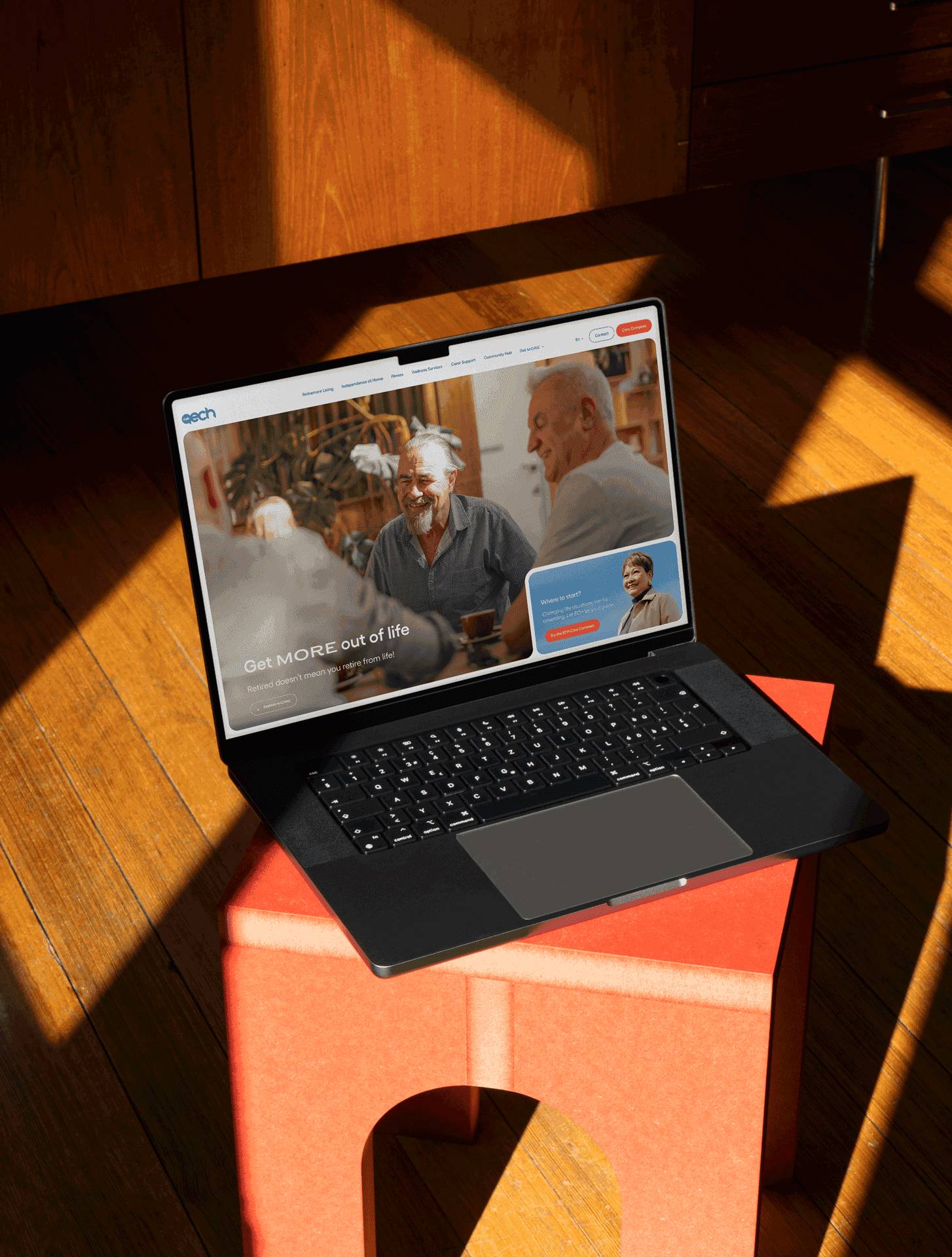 The 'ECH' Website displayed on a laptop sitting on a bench.