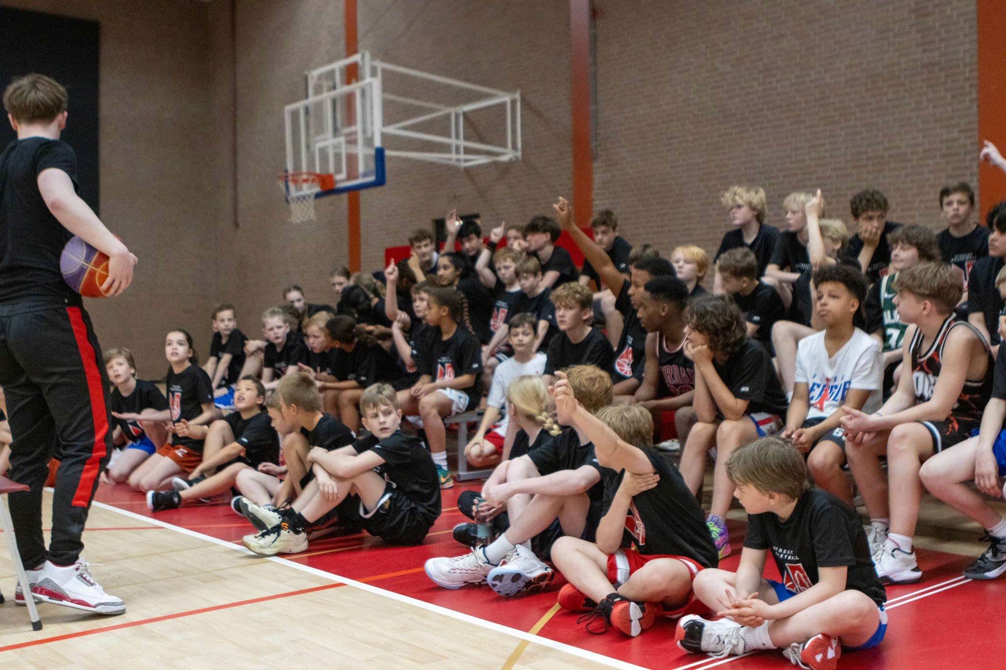 A muscular man lifting a dumbbell and looking upward with a focused expression. Quote below reads: “I’ve never felt this strong and confident in my life…” – Samantha Lee, Marketing Director.