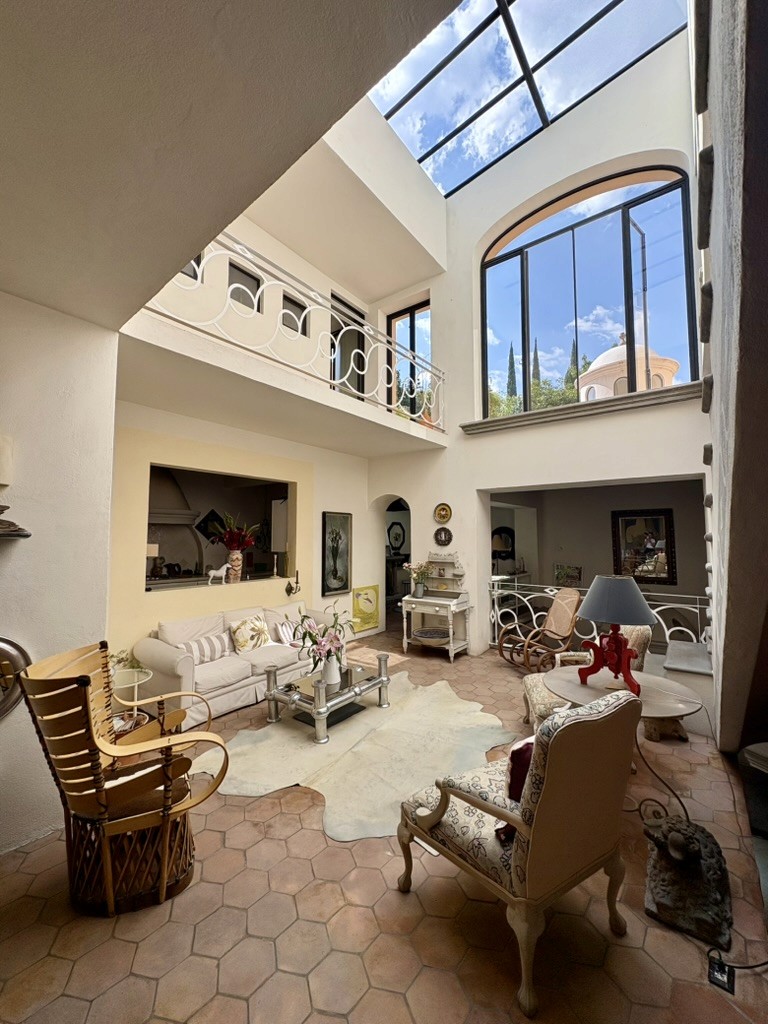 Wide atrium and staircase at Casa de los Tíos