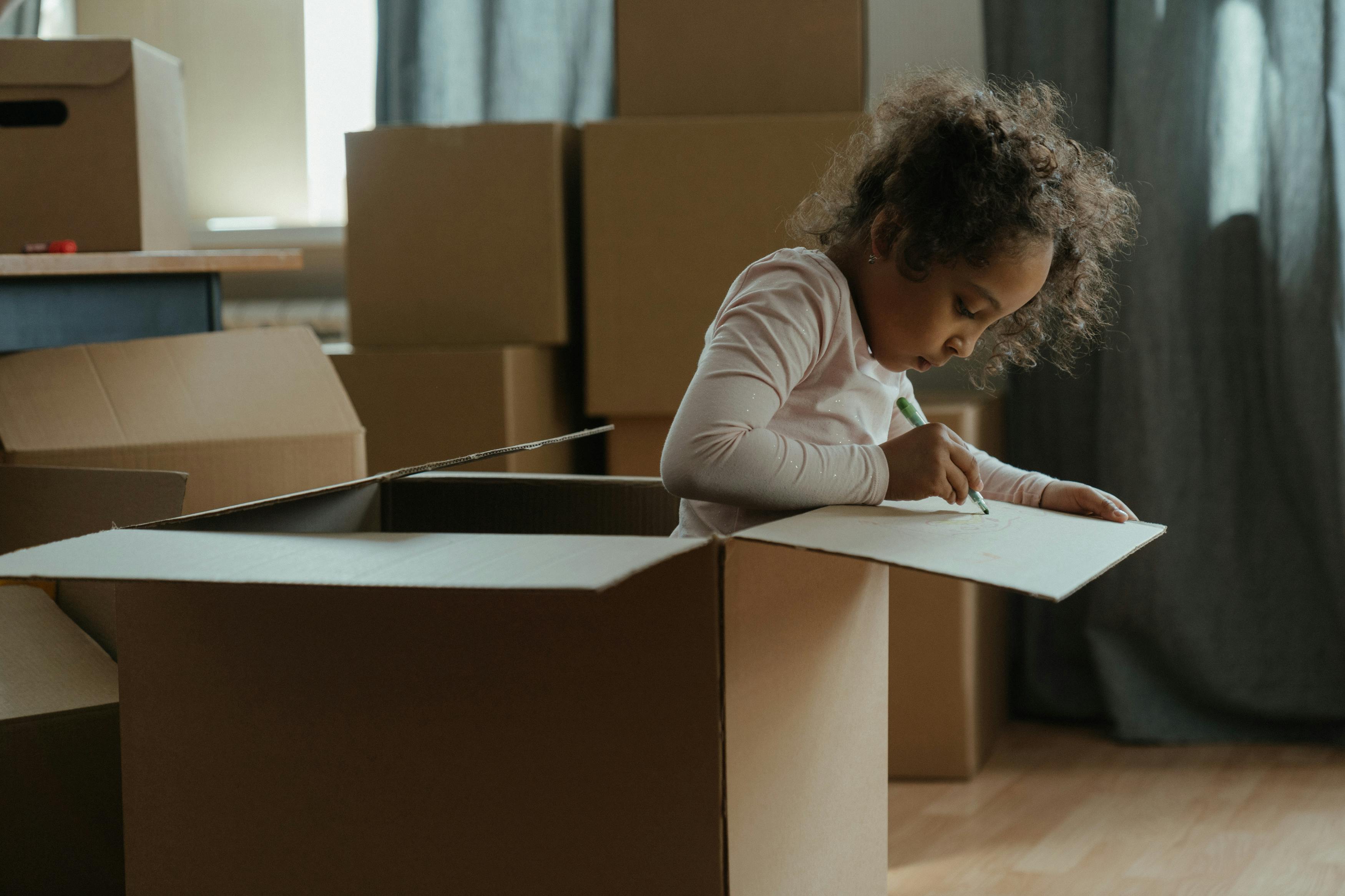 Gordon Moving & Storage customer's child labeling boxes