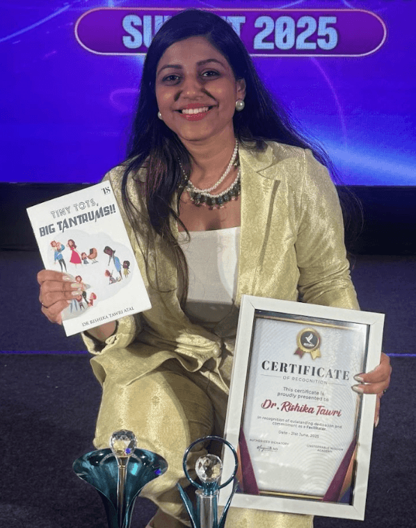 a young boy is jumping in the air on a road