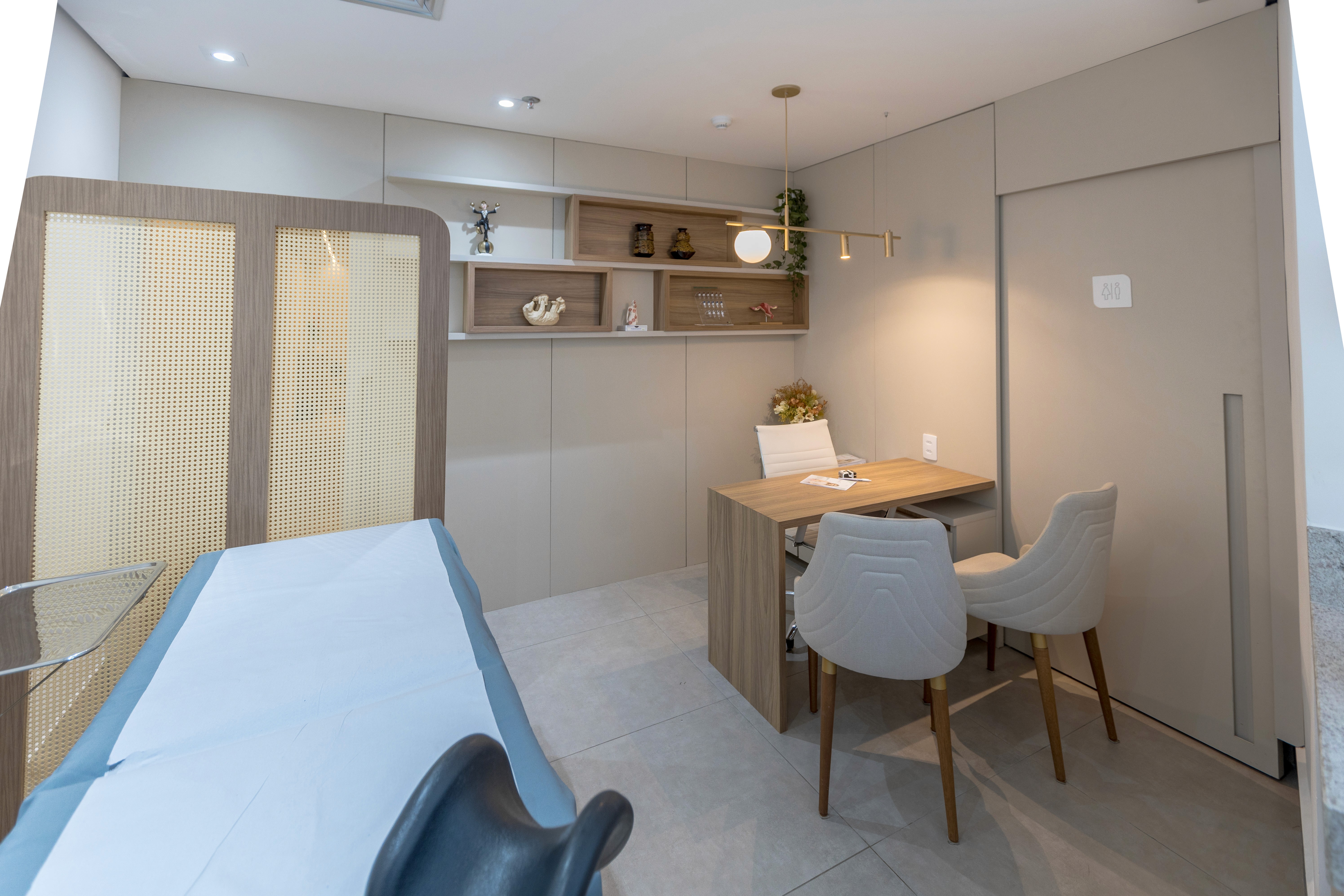 a black and white living room with a large tv