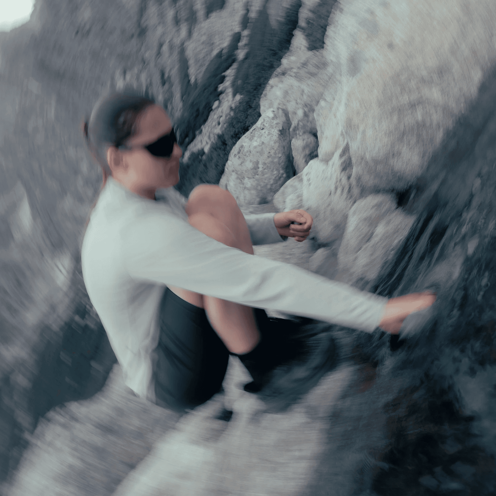 dynamic portrait of a woman in front of the mountain river.