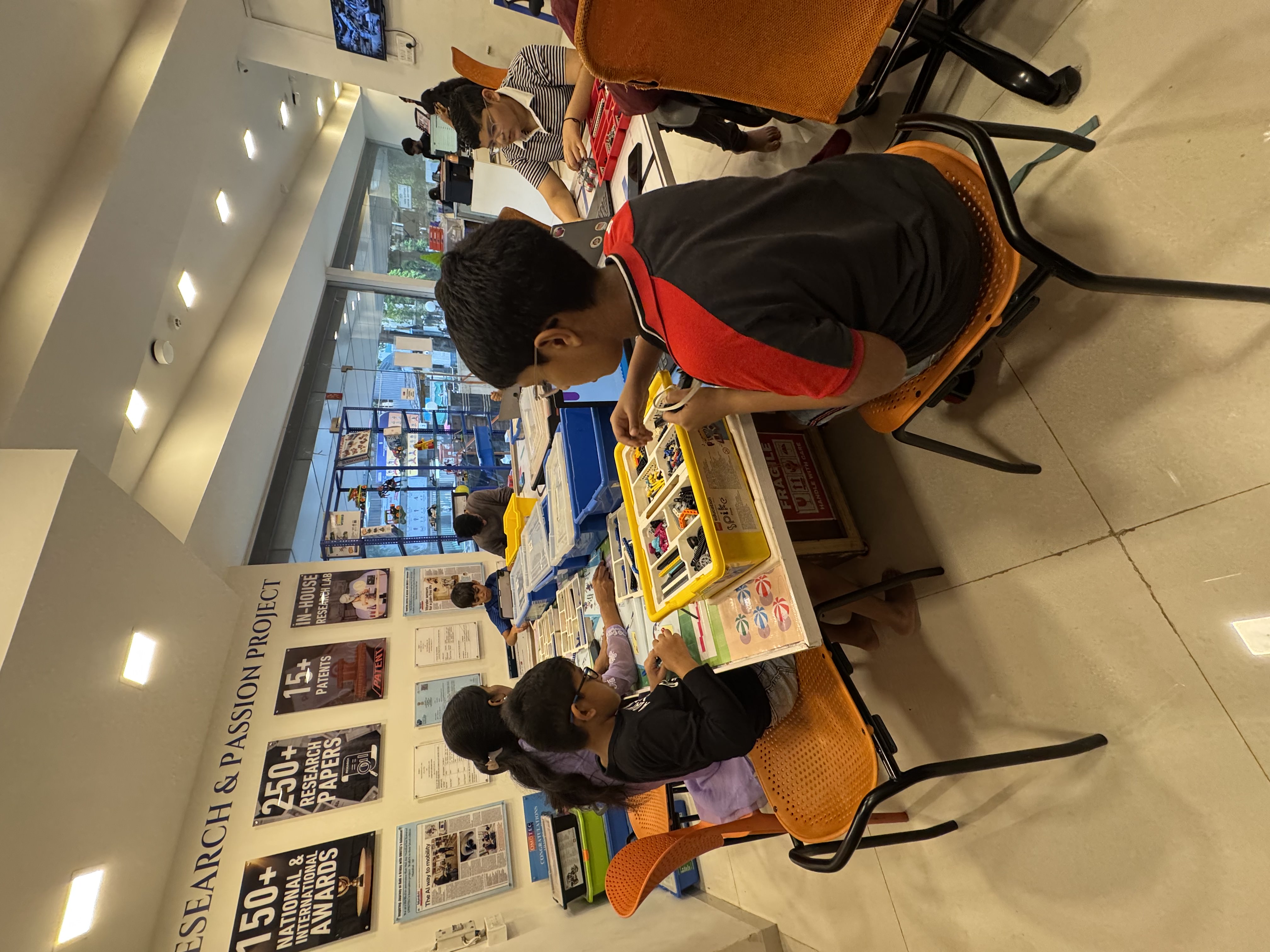 Palm trees frame a dramatic mountain valley landscape