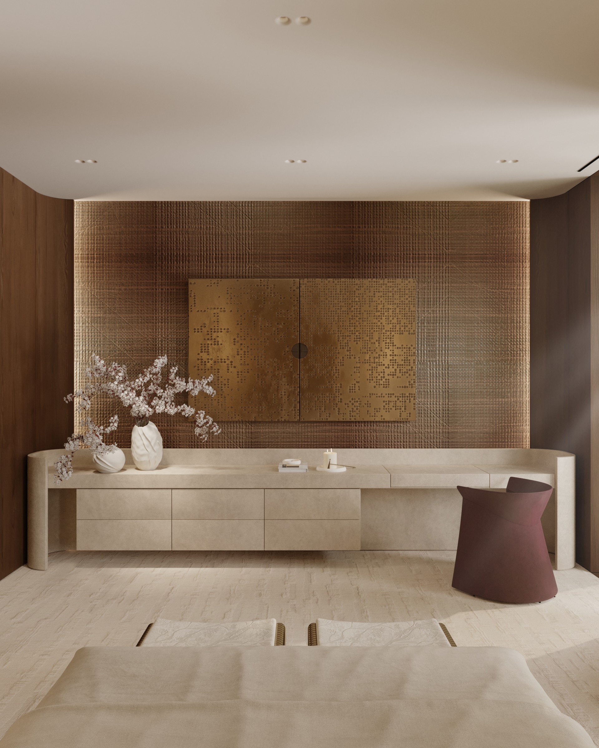 A modern interior featuring a light wooden sideboard, decorative items, and a textured wall in warm tones.