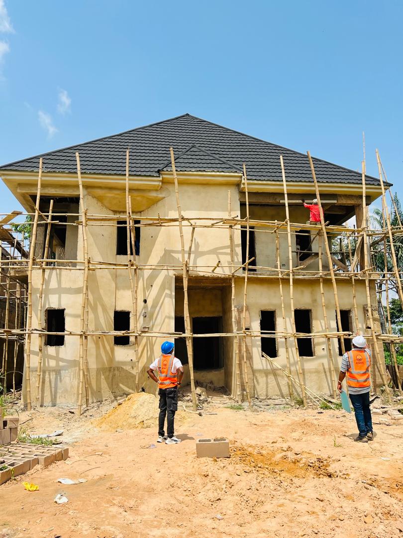 round clear glass-top table and five gray chairs dining se
