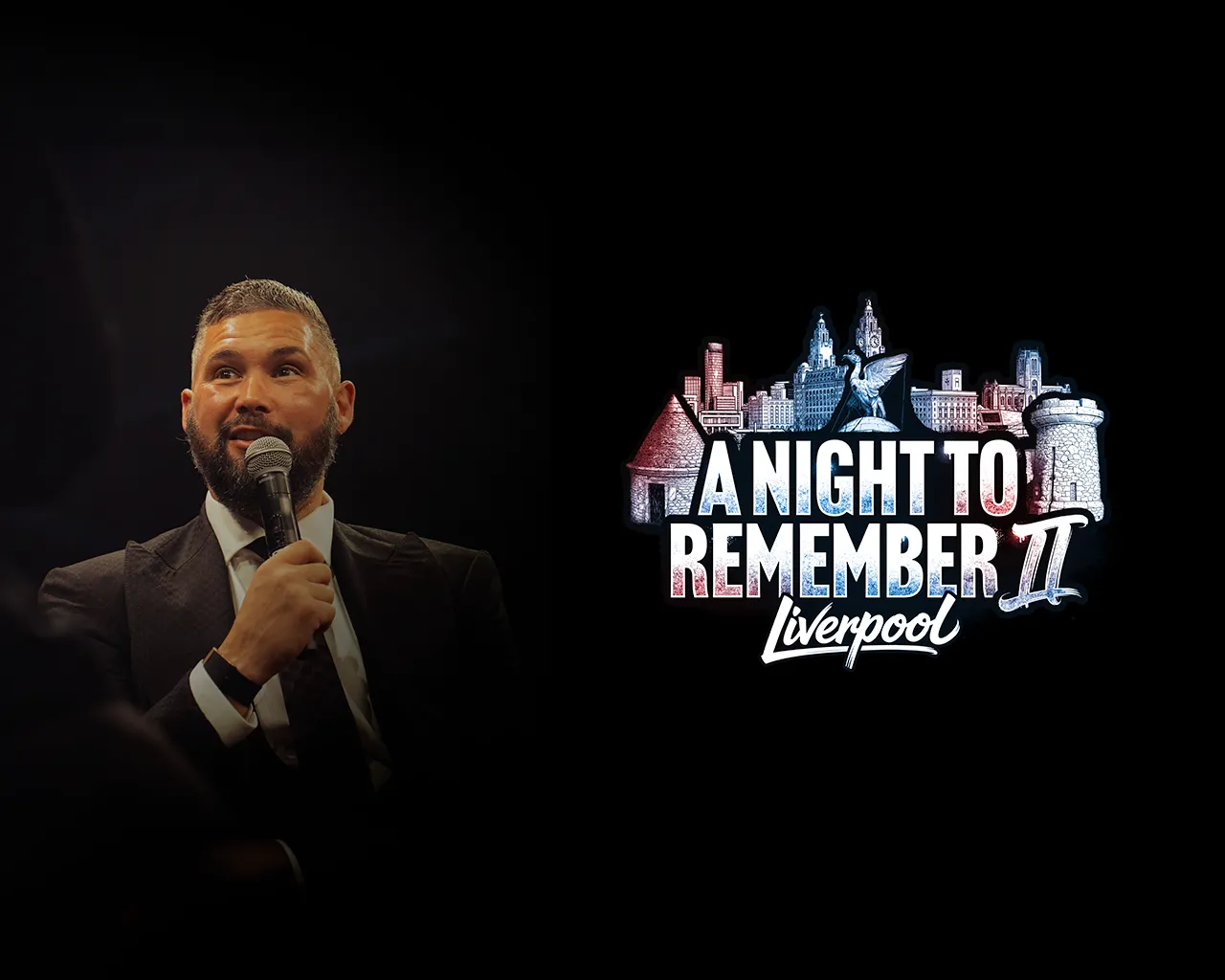 A speaker holding a microphone beside the A Night To Remember II Liverpool event logo, featuring the city's skyline