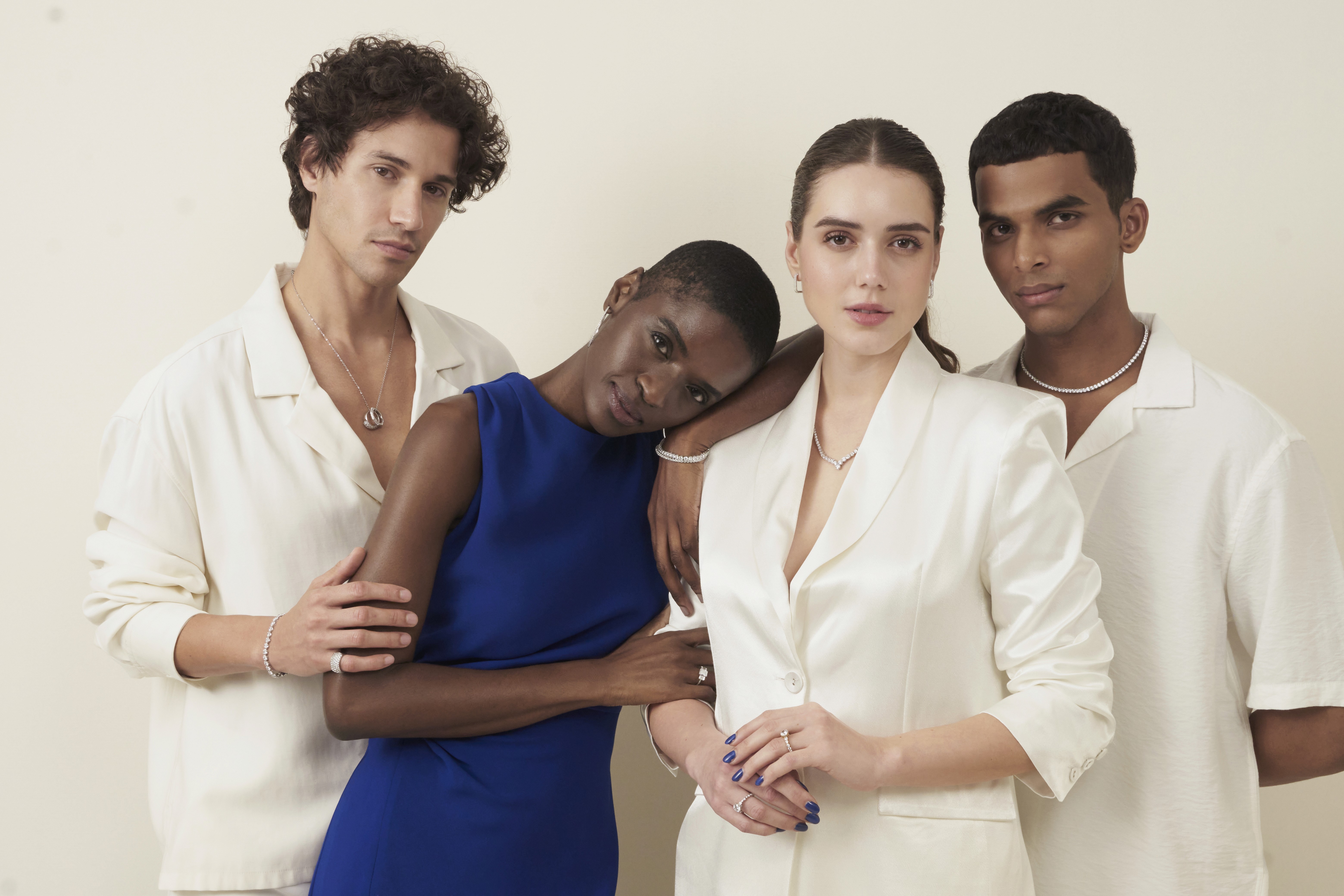 Friends laughing and posing inside a car