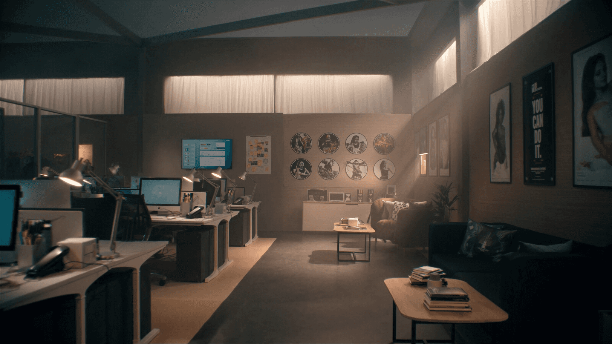 Marketing agency office with brand mood boards and social media analytics