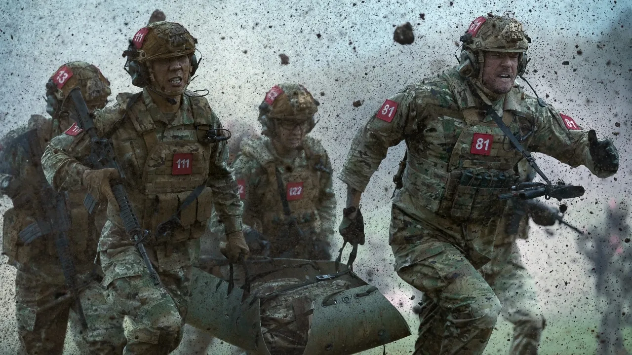 Men in tactical gear sprint through a muddy battlefield, carrying equipment amid flying debris, emphasizing the urgency and intensity of a military operation.