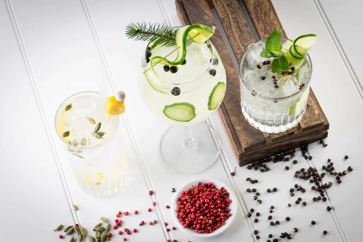 3 cocktails in different glasses