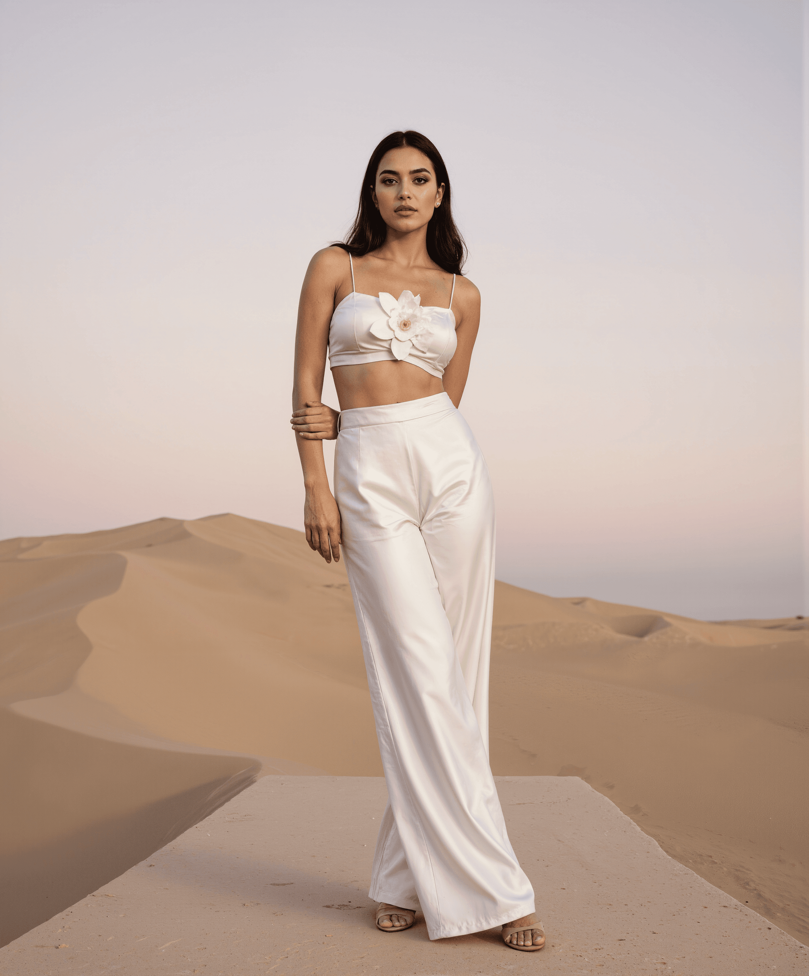 ai generated female model in white top pant set
