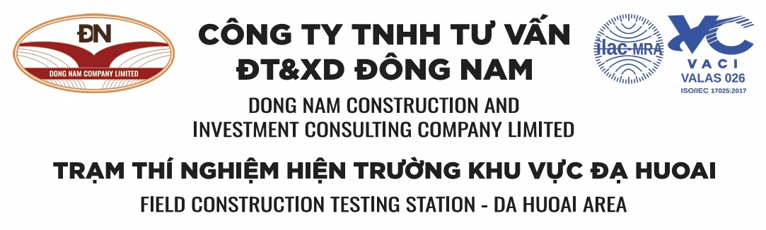 Skyscrapers stand by a river in the city.