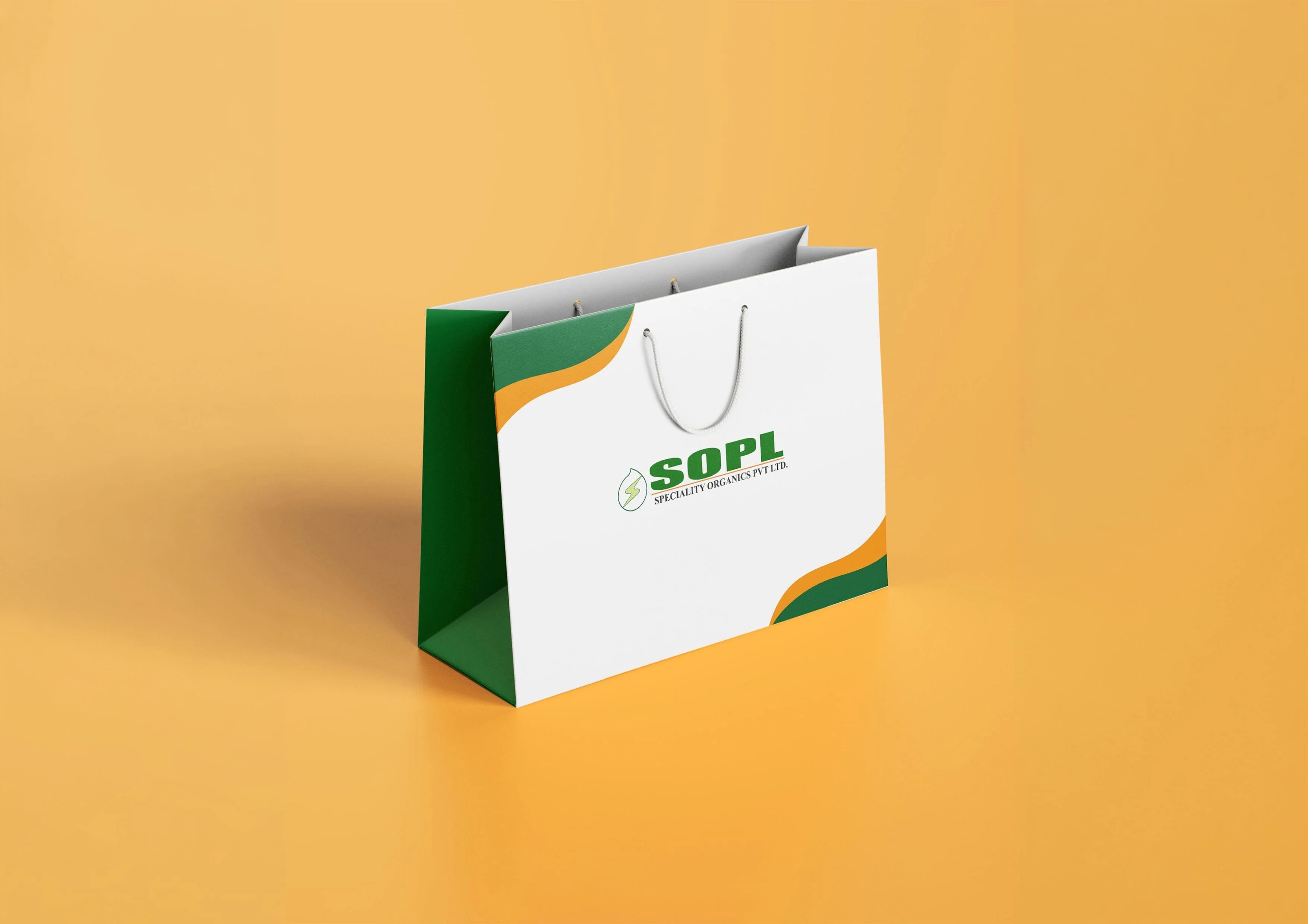White SOPL paper shopping bag with green and orange accents on a warm orange background, presenting a clean, professional branding mockup.