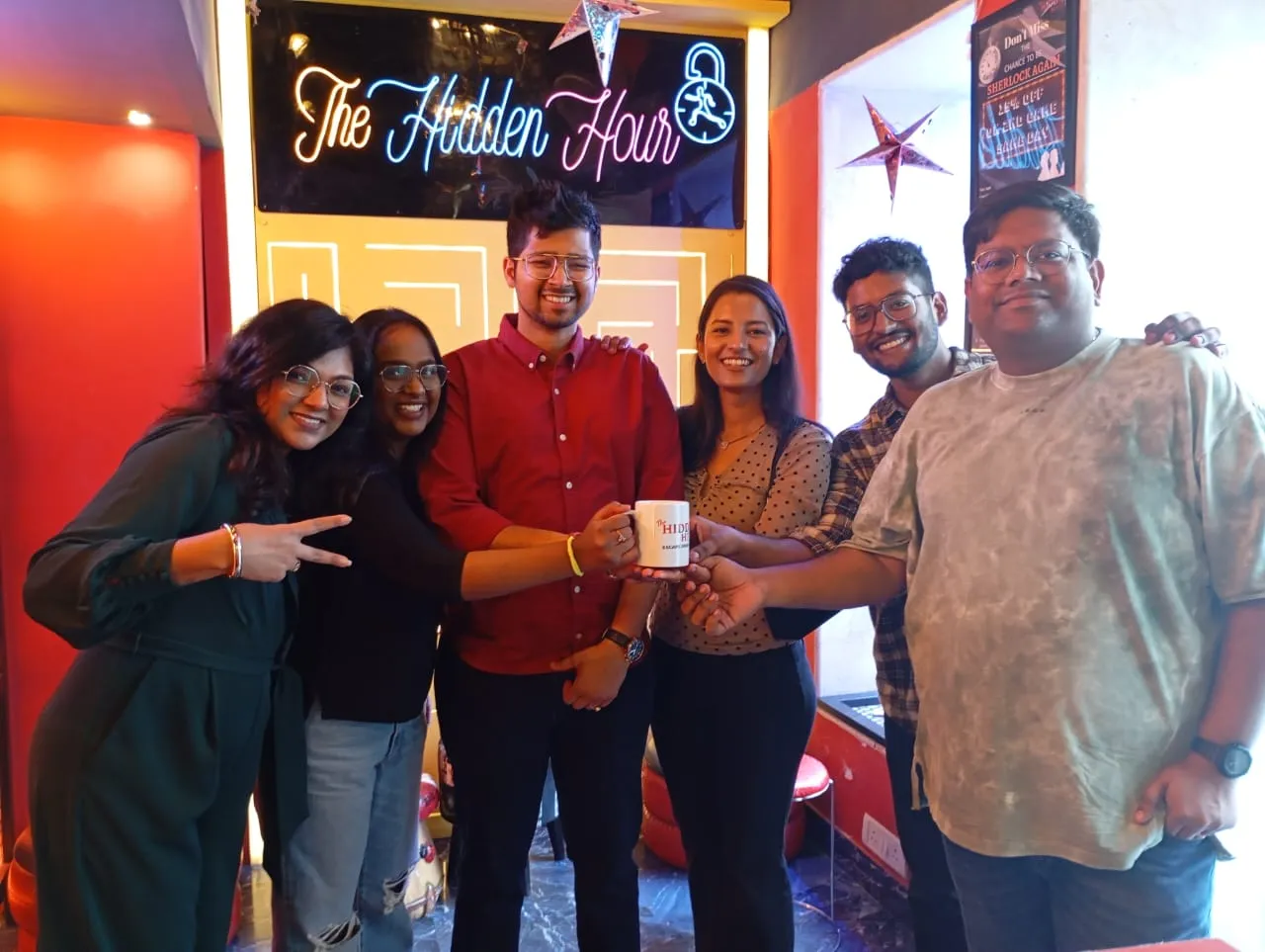 Temamates posing after playing mystery escape room