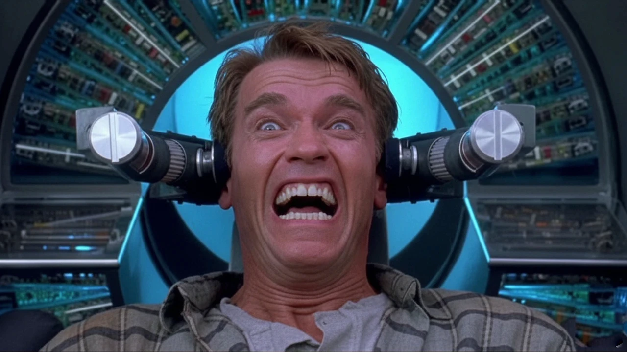 Un homme est installé dans une machine futuriste, encadré par des bras mécaniques positionnés près de sa tête et par un fond rempli de composants électroniques. Il ouvre grand les yeux et montre les dents dans une expression de tension extrême, comme s’il vivait un téléchargement massif d’informations ou une reprogrammation mentale. Cette scène, associée à l’idée de “total recall”, illustre un recalibrage radical de l’expérience, en écho à la thématique de l’art de séduire et convaincre par une expérience candidat marquante et mémorable.