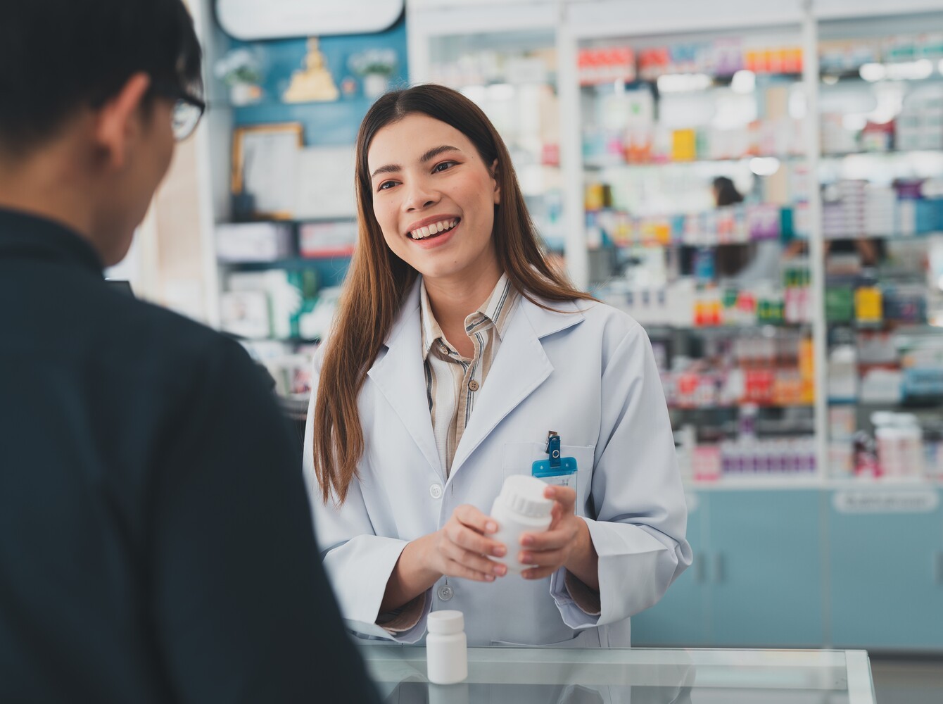 man visiting a pharmacy to get OTC FDA weight loss pills