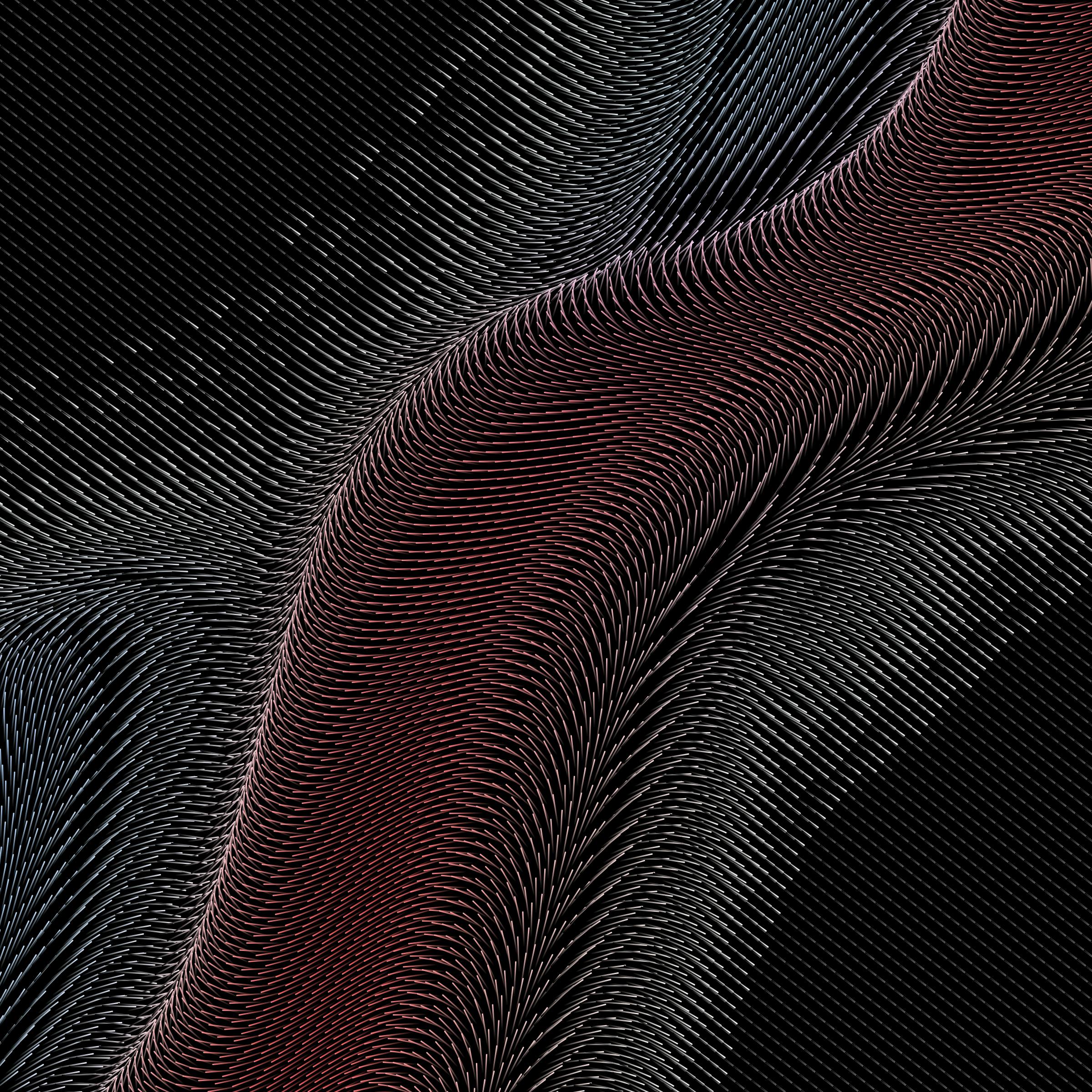 Laptop on a clean desk next to modern decor.