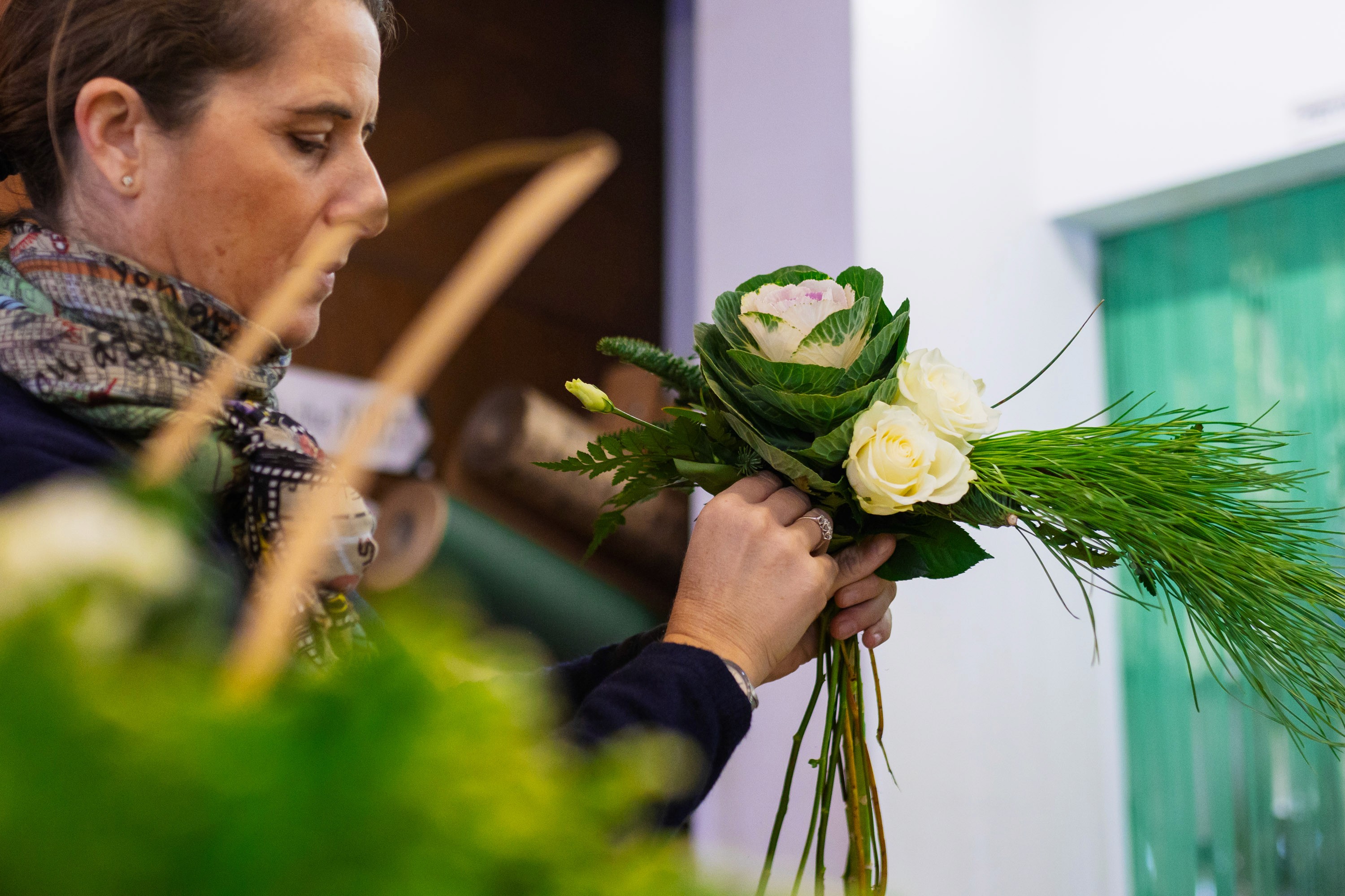 Francesca creating a flower composition