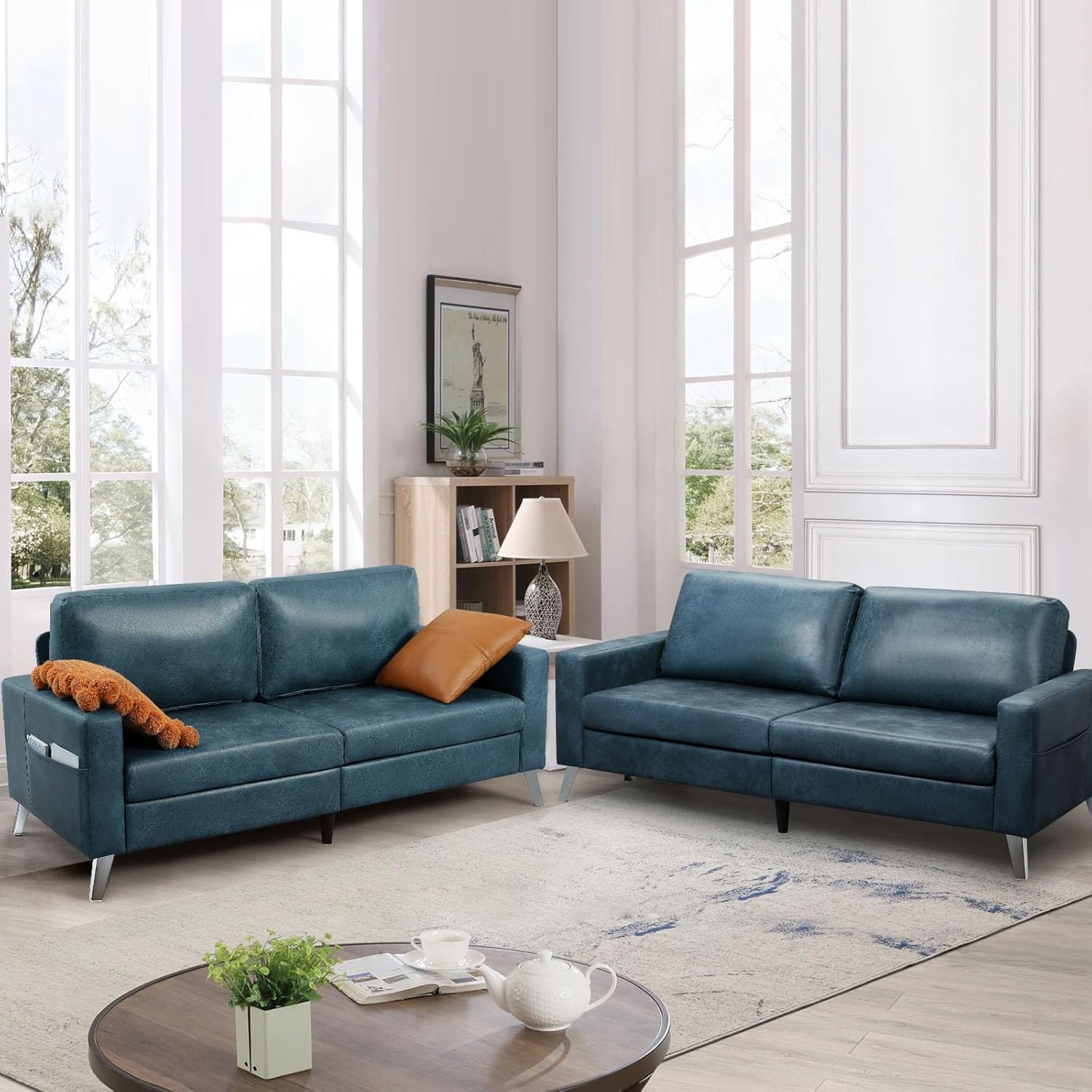 Modern navy leather sofa with sleek design, durable leather upholstery, perfect for adding a sophisticated touch to any living room.