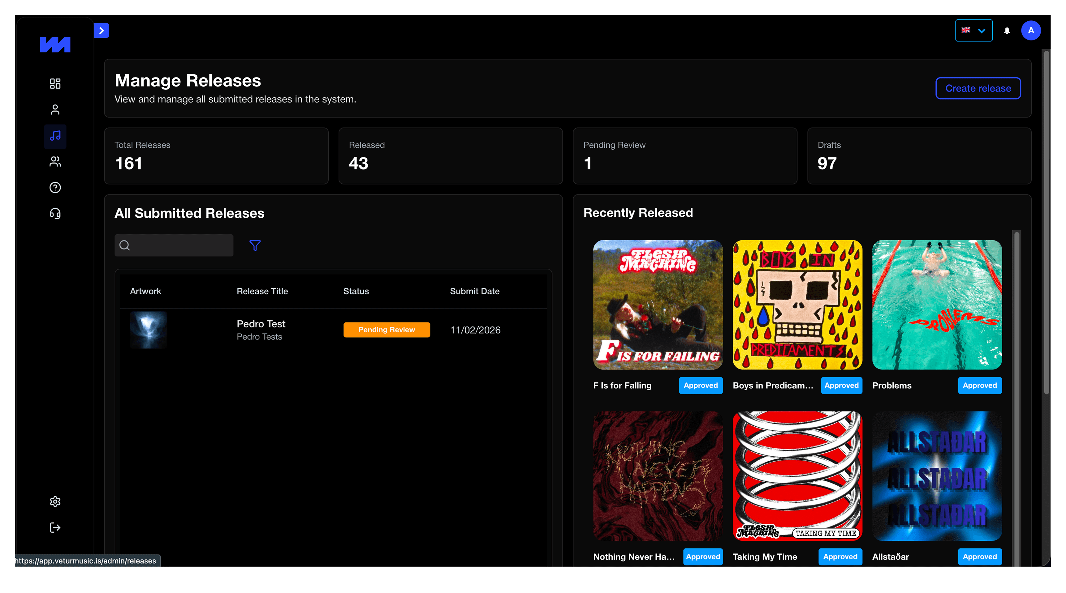 A large orange truck driving down a dirt road