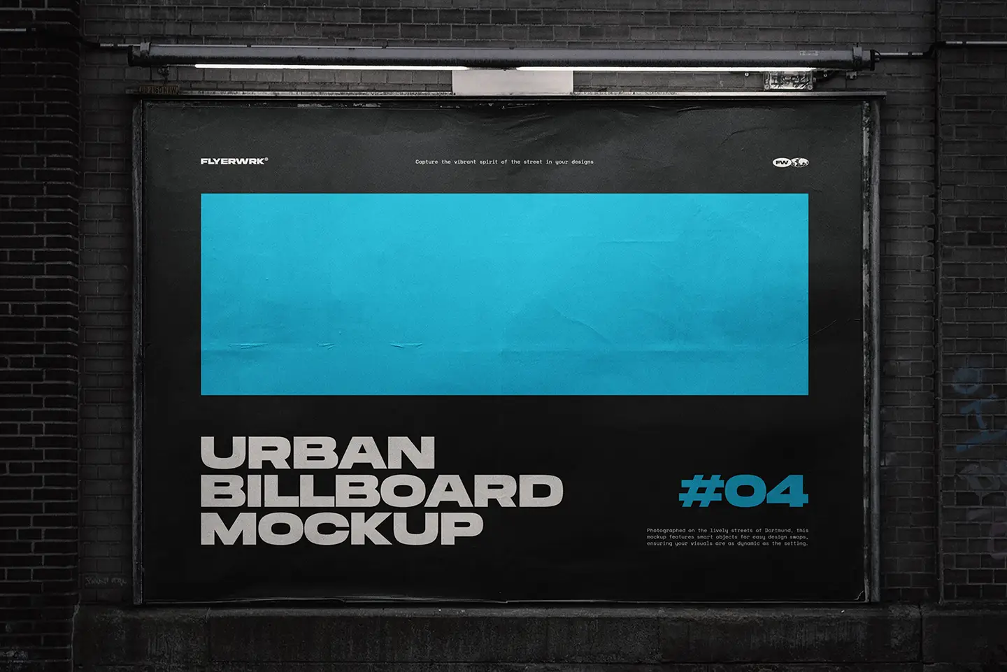 Urban billboard mockup installed on brick wall illuminated by city street lighting