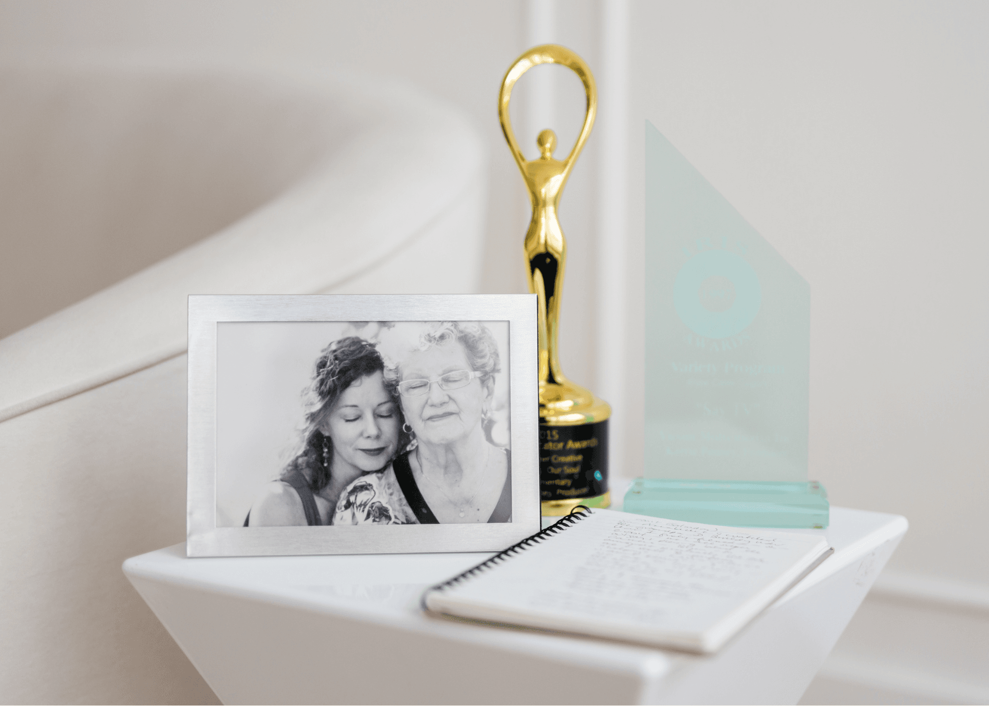 A spread of images, work, and awards that have lead Kerrie to Secret Heart Broadcasting