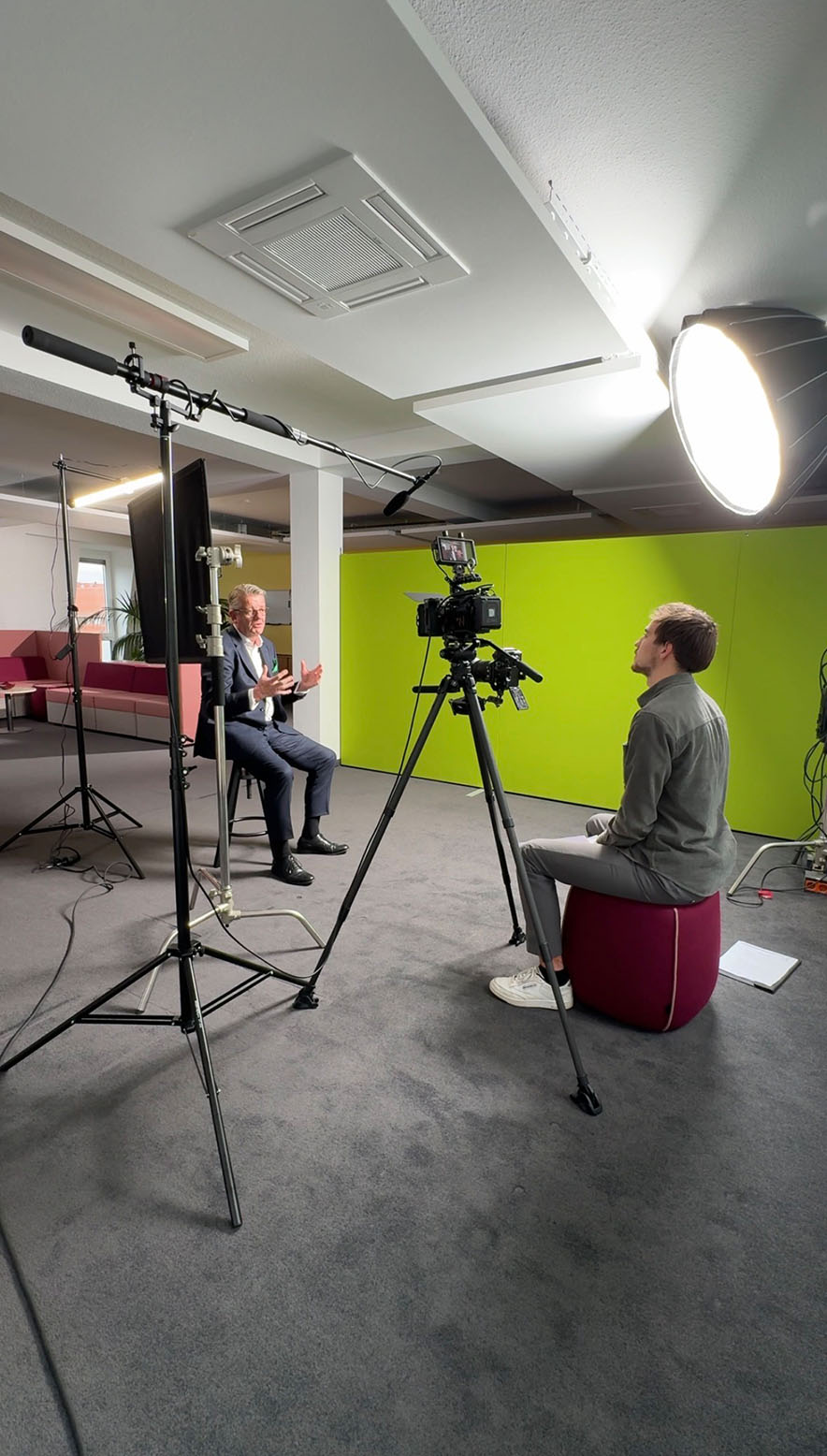 Strategic film production setup for a storytelling ad campaign, featuring interview footage for social media communication.