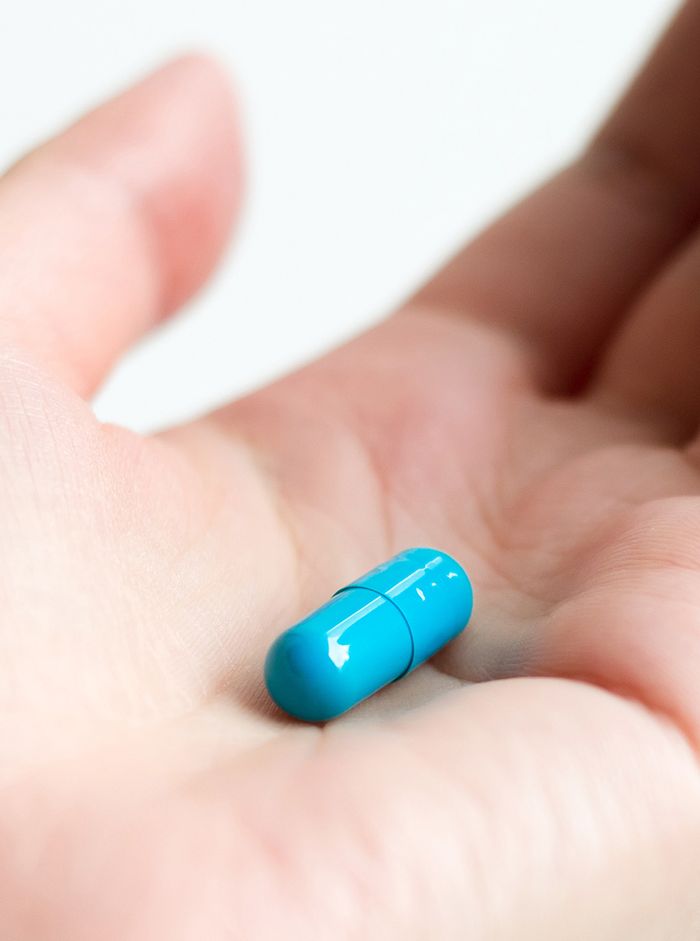 Oral Conscious Sedation pill in the palm of a hand