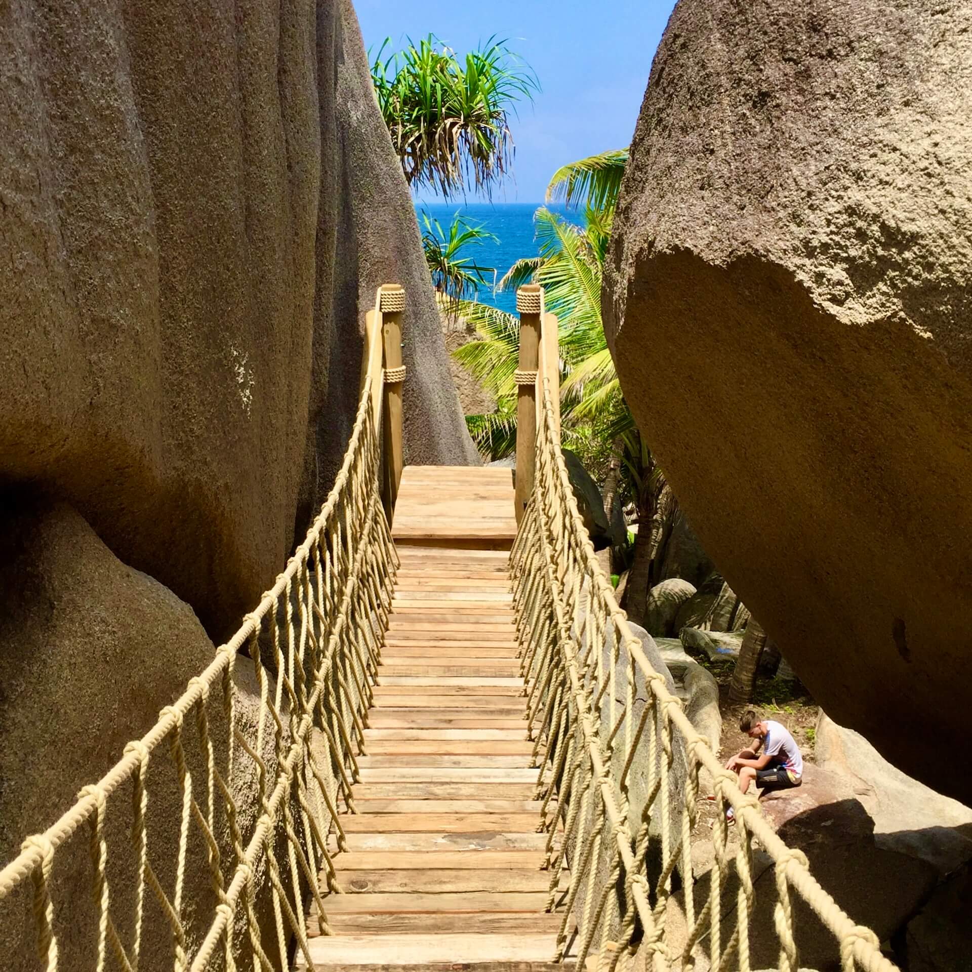 Streetside billboard with flyposters of the Batch.Works brand and illustrations