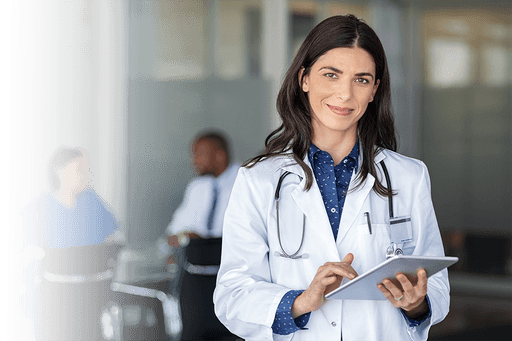 A doctor points at a floating user interface with a stethoscope
